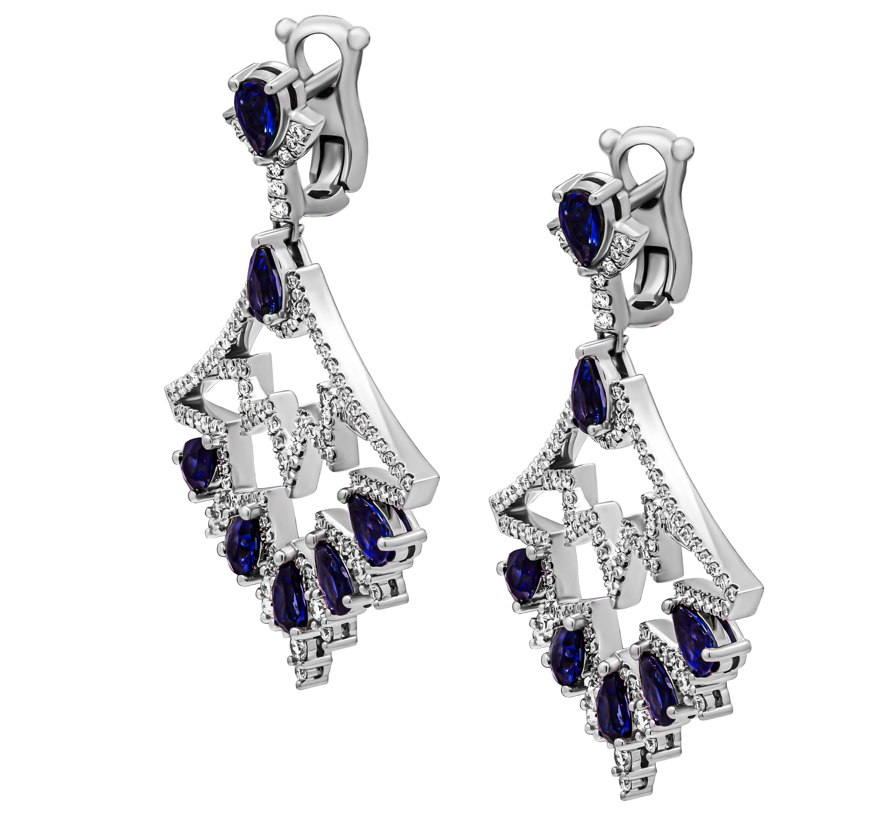 ntroducing our stunning Blue Sapphire Chandelier Diamond Earrings, crafted with meticulous attention to detail in lustrous 18K white gold. These earrings are a true embodiment of sophistication and glamour, featuring a mesmerizing array of fourteen