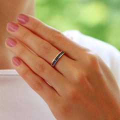 Blue Sapphire Channel Set Half Eternity Ring in 18k Yellow Gold