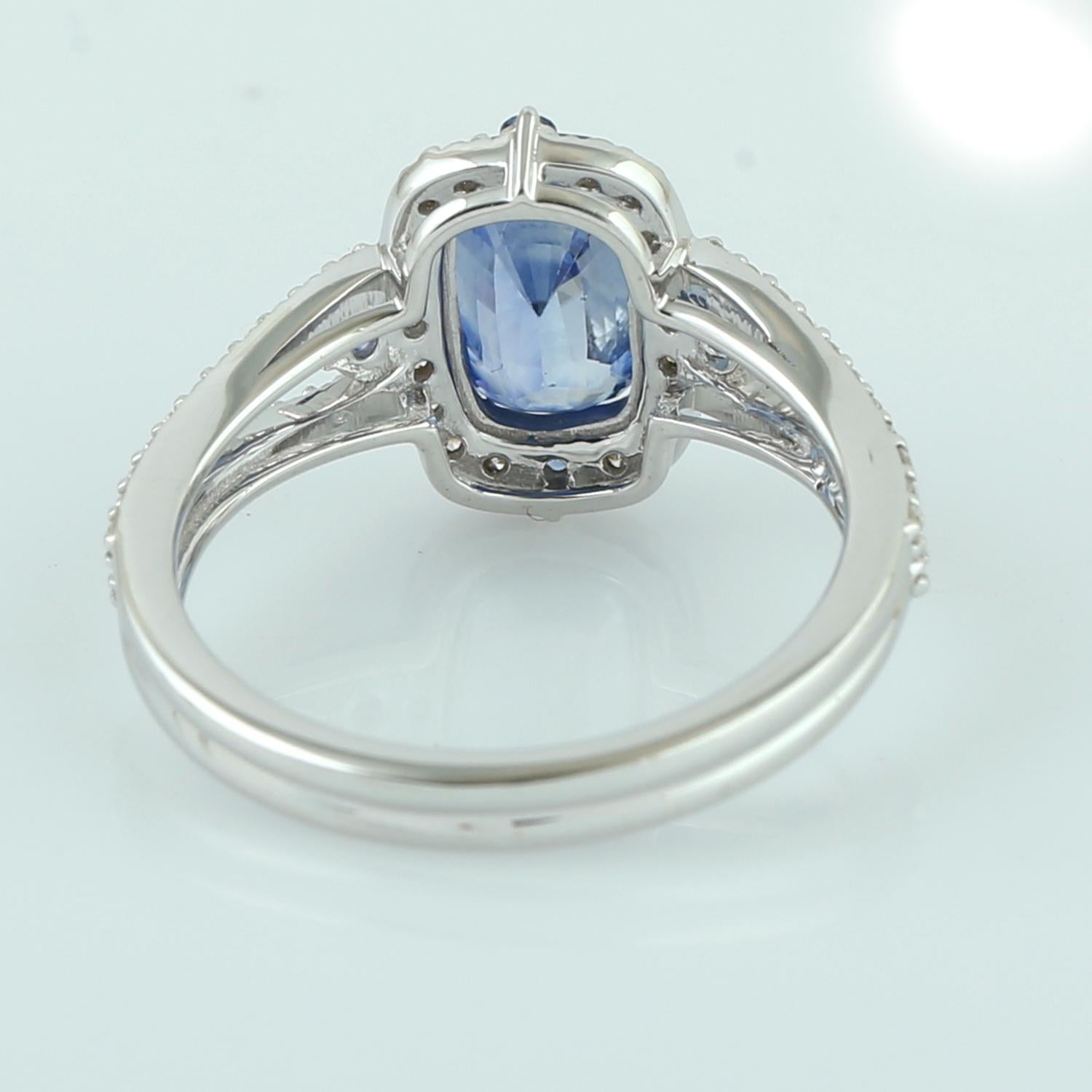 Women's Blue Sapphire Cocktail Ring With Pave Diamonds Made In 18k White Gold For Sale