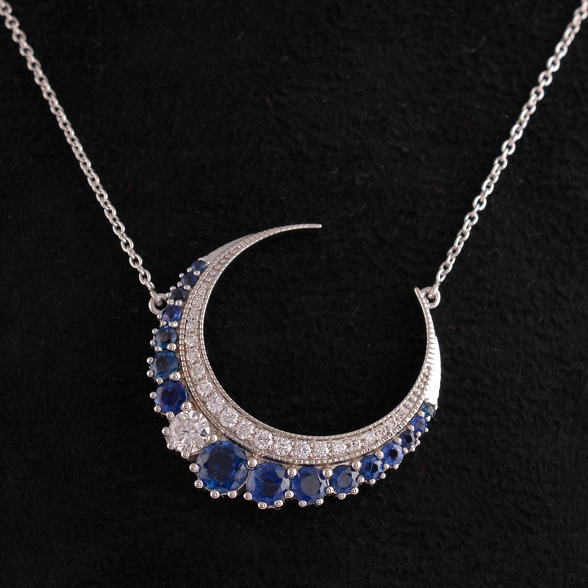 Elevate your jewelry collection with this enchanting Blue Sapphire Crescent Moon Pendant Necklace. Crafted from 14 karat white gold, this exquisite piece showcases a celestial-inspired design that exudes elegance and charm.

The centerpiece of this