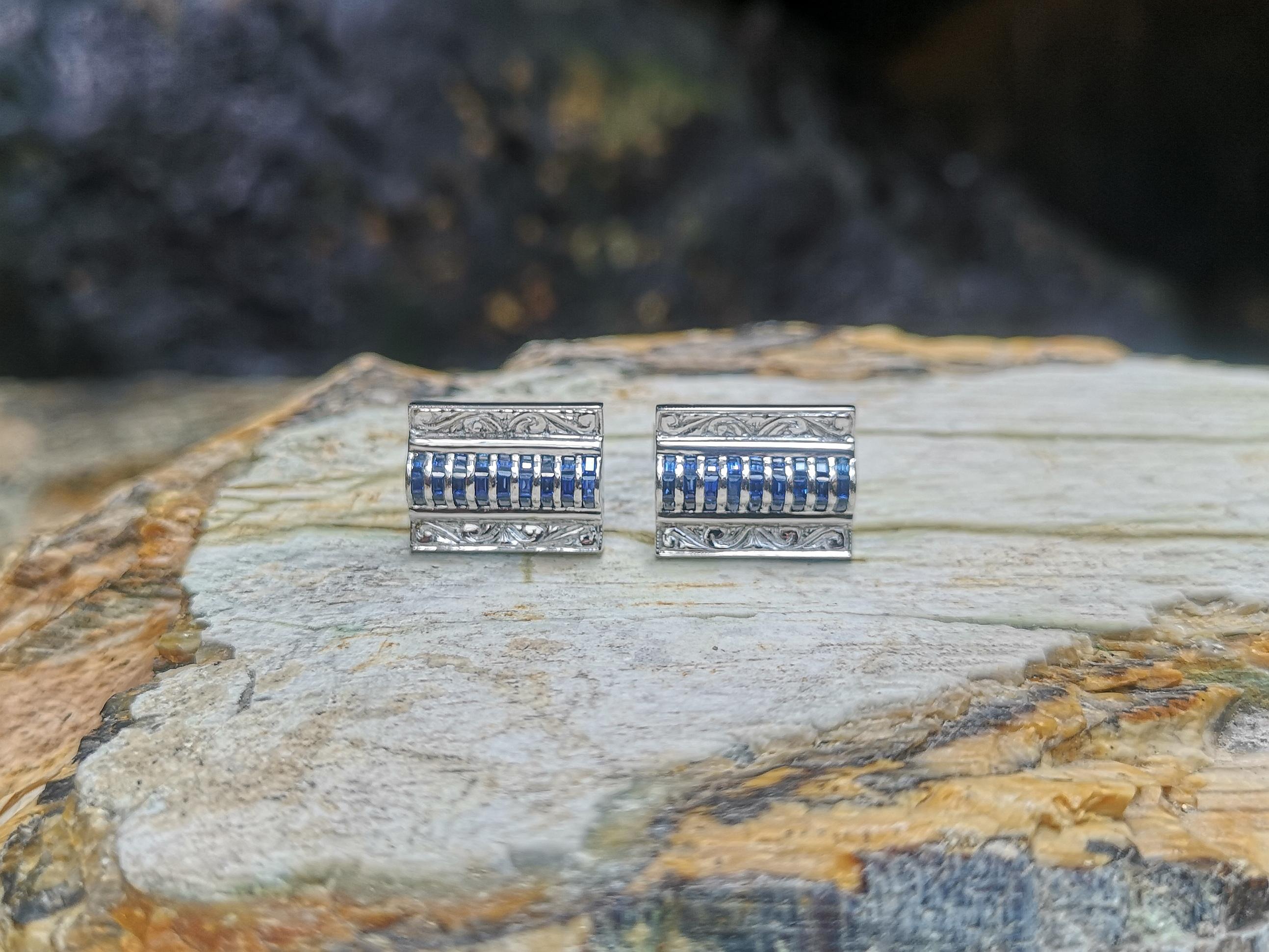 Blue Sapphire 2.37 carats Cufflinks set in 18 Karat White Gold Settings

Width:  1.8 cm 
Length: 1.3 cm
Total Weight: 14.82grams

