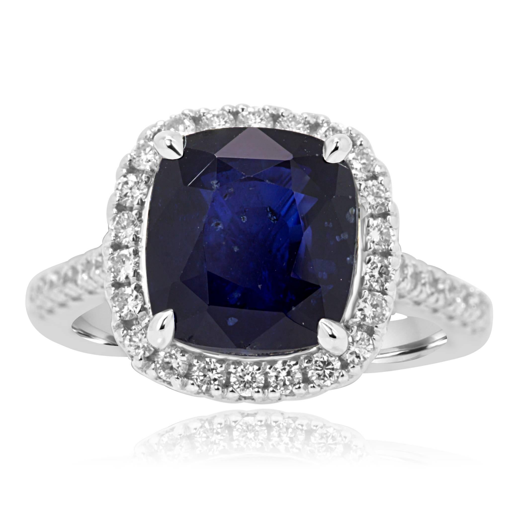 Stunning GIA Certified Cushion Blue Sapphire 6.62 Carat encircled in a single Halo of Colorless Round Diamonds VS-SI clarity 0.54 Carat in 14K White Gold Bridal Fashion Ring.

Style available in different price ranges. Prices are based on your