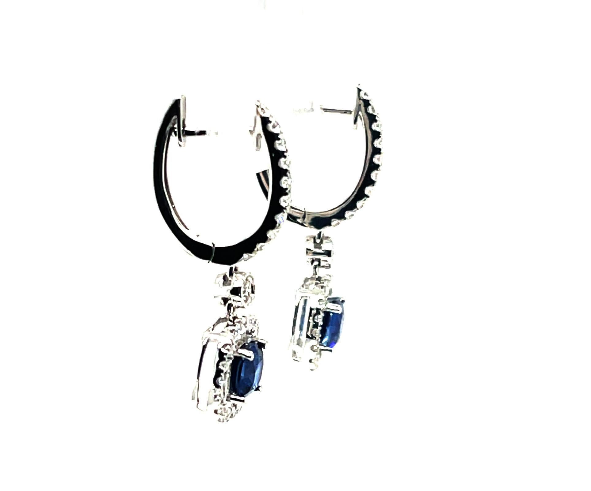 Artisan Blue Sapphire and Diamond Halo Dangling Drop Earrings in White Gold