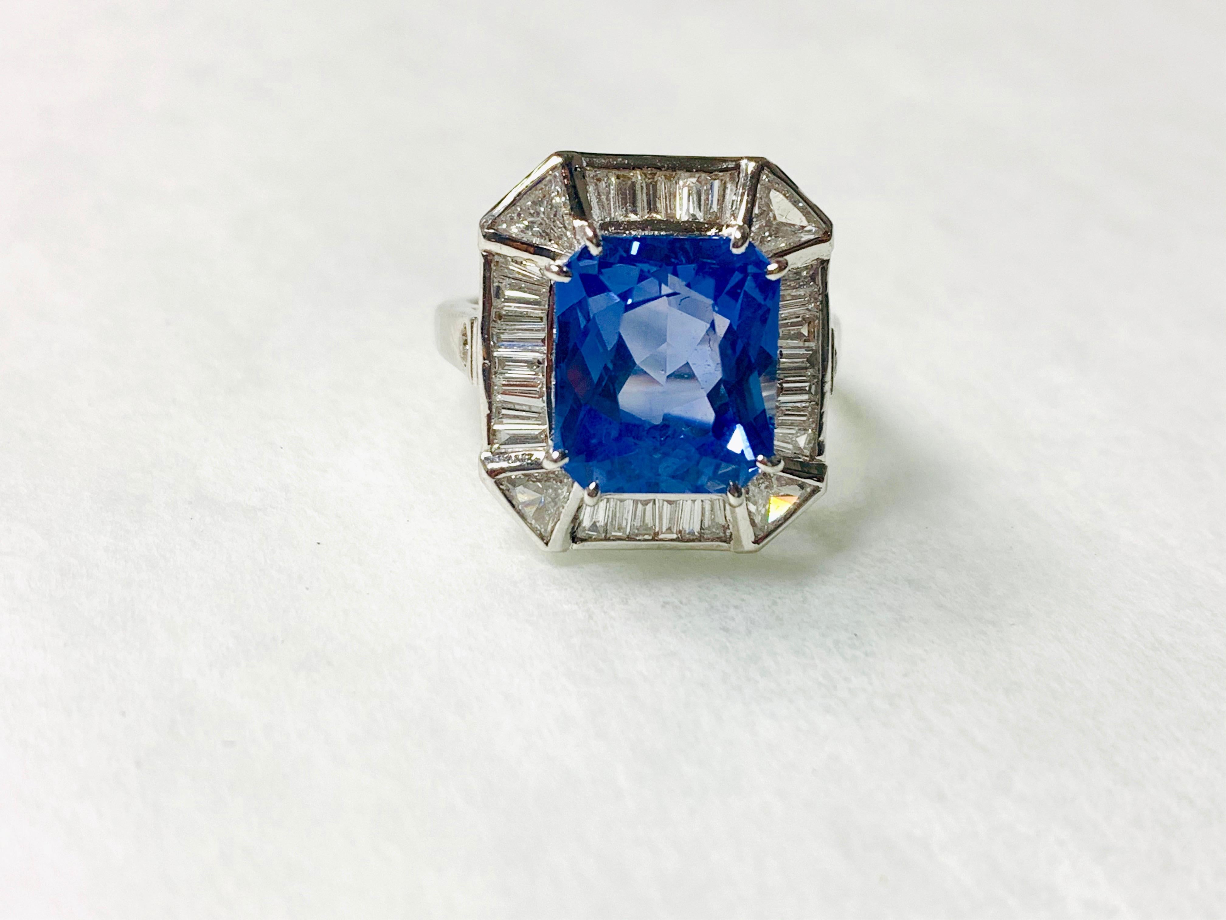 Moguldiam Inc's Cushion Cut Blue Sapphire And Diamond Engagement Ring In 18 K White Gold is beautifully handmade in 18 K white gold. 

Blue Sapphire : 7.42 carat 
White Diamond weight : 1.12 carat ( G color and VS clarity ) 
Gold weight : 5.39 grams