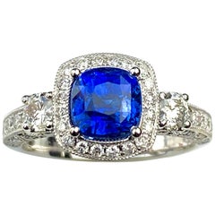 Blue Sapphire Cushion Cut Antique Style Ring with White Diamond Details Blue Sapphire Cushion Cut Antique Style Ring with White Diamond Details