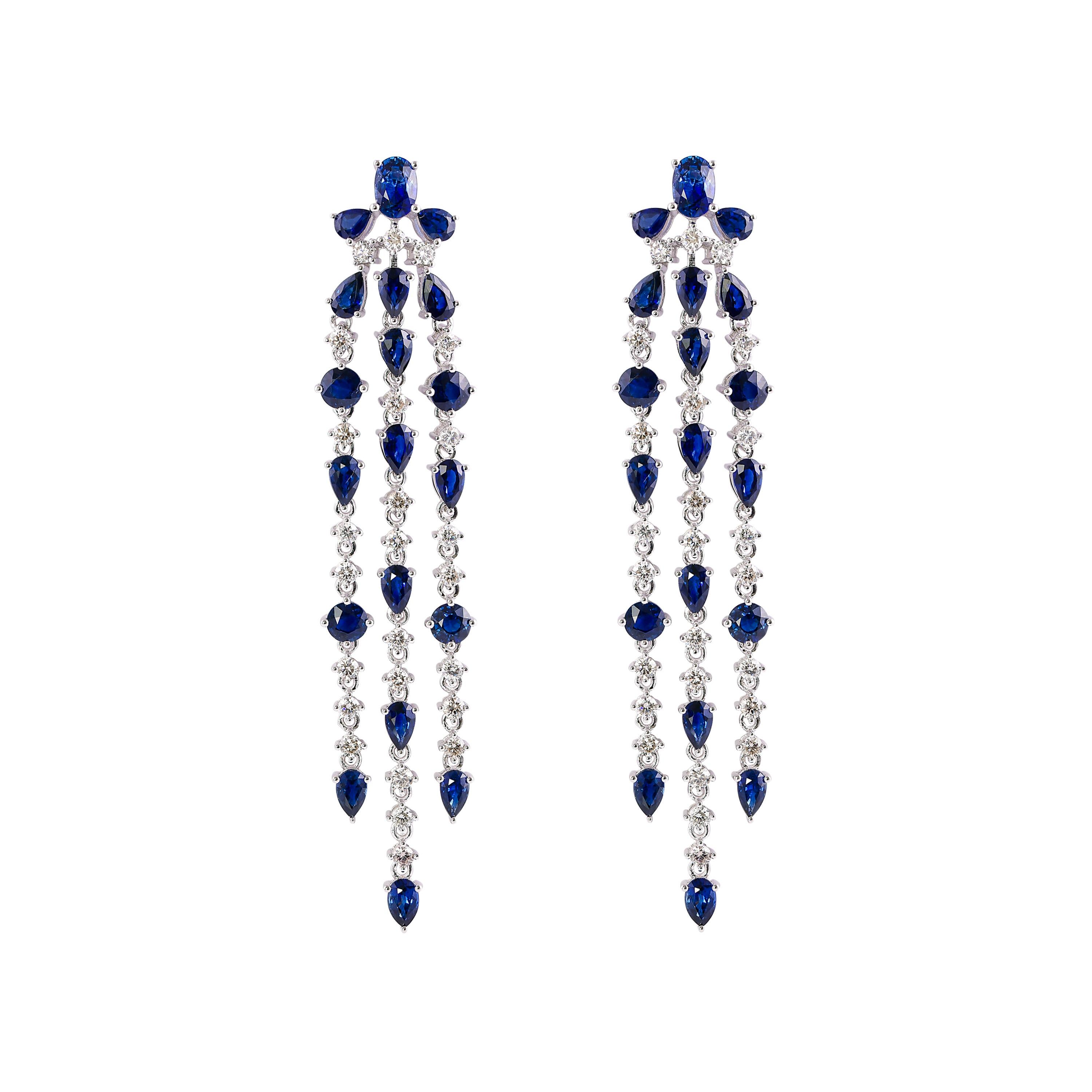 An exclusive collection of designer and unique dangle earrings by Sunita Nahata Fine Design. 

Blue Sapphire Pearl Dangle Earring in 18 Karat White Gold.

Blue Sapphire: 1.326 carat, 6X4 Size, Oval Shape.
Blue Sapphire: 6.473 carat, 5X3 Size, Pear