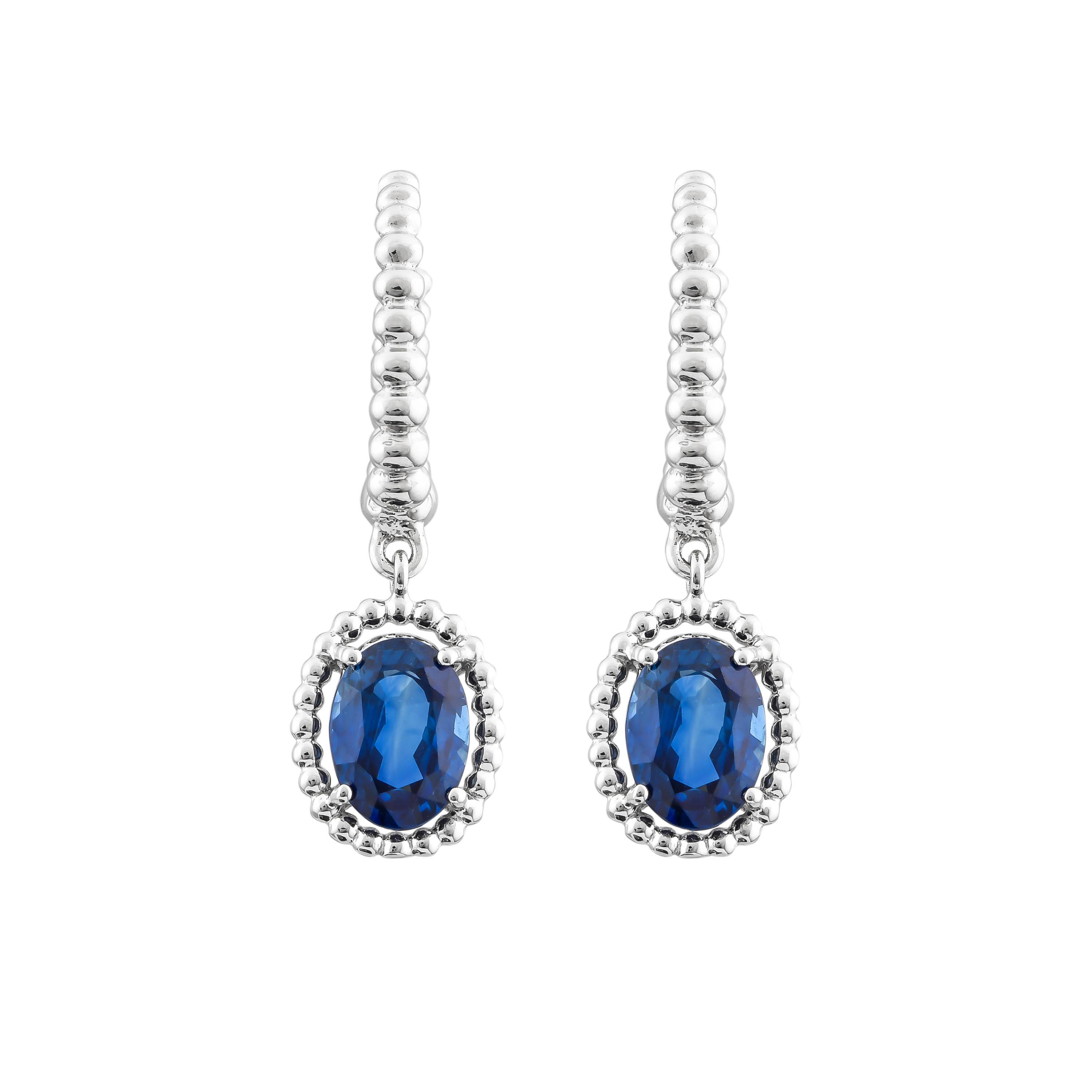 Oval Cut Blue Sapphire Dangle Earring in 18 Karat White Gold For Sale