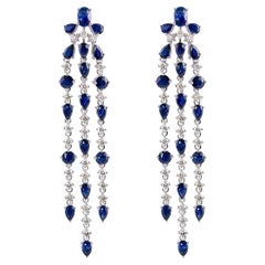 Blue Sapphire Dangle Earring in 18 Karat White Gold