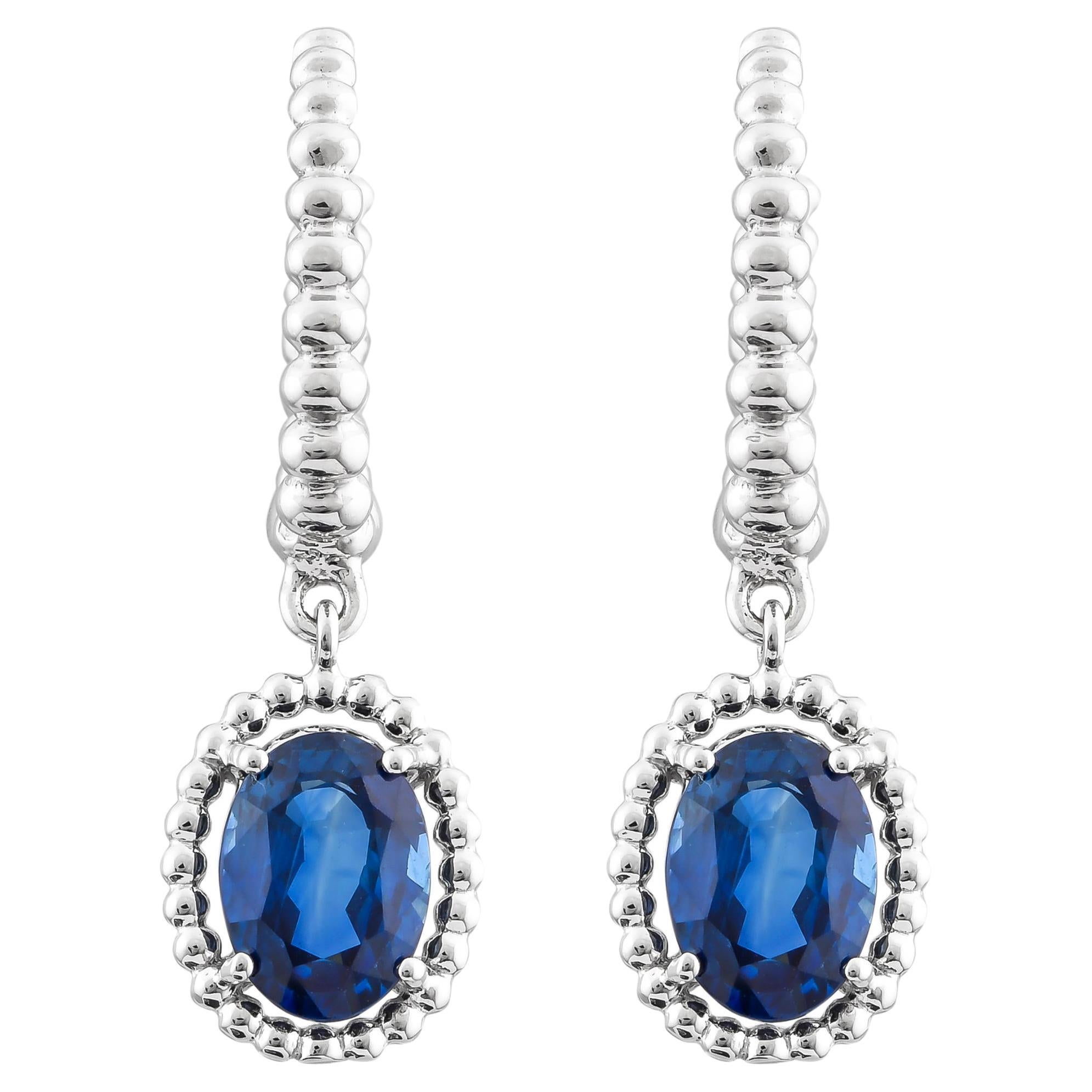 Blue Sapphire Dangle Earring in 18 Karat White Gold