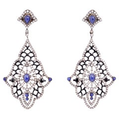 Pendants d'oreilles avec saphir bleu et diamants 8.22 carats