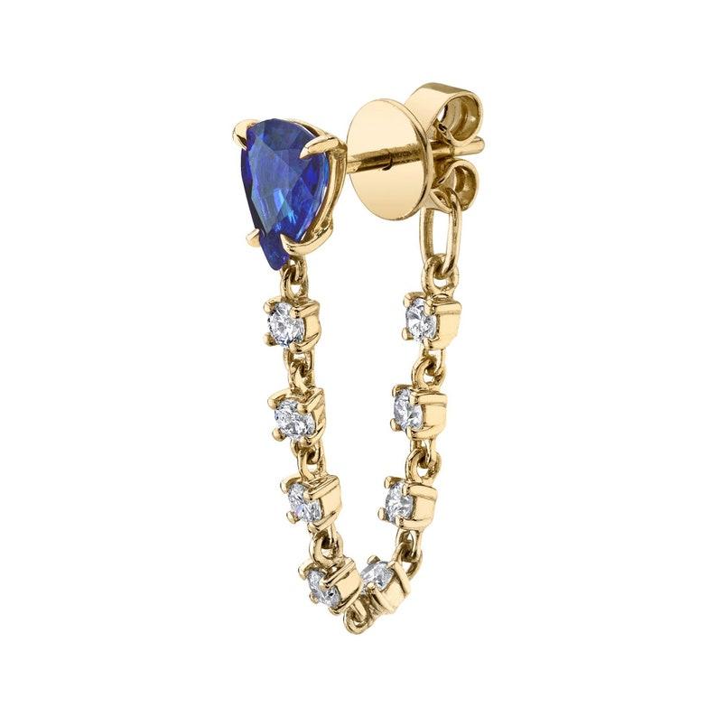 Cast in 14 karat gold, these earrings are hand set with 1.40 carats blue sapphire and .50 carats of sparkling diamonds. Available in Rose, Yellow and White gold. Comes in pair, can also be bought as single earring. See other gemstones, emerald and