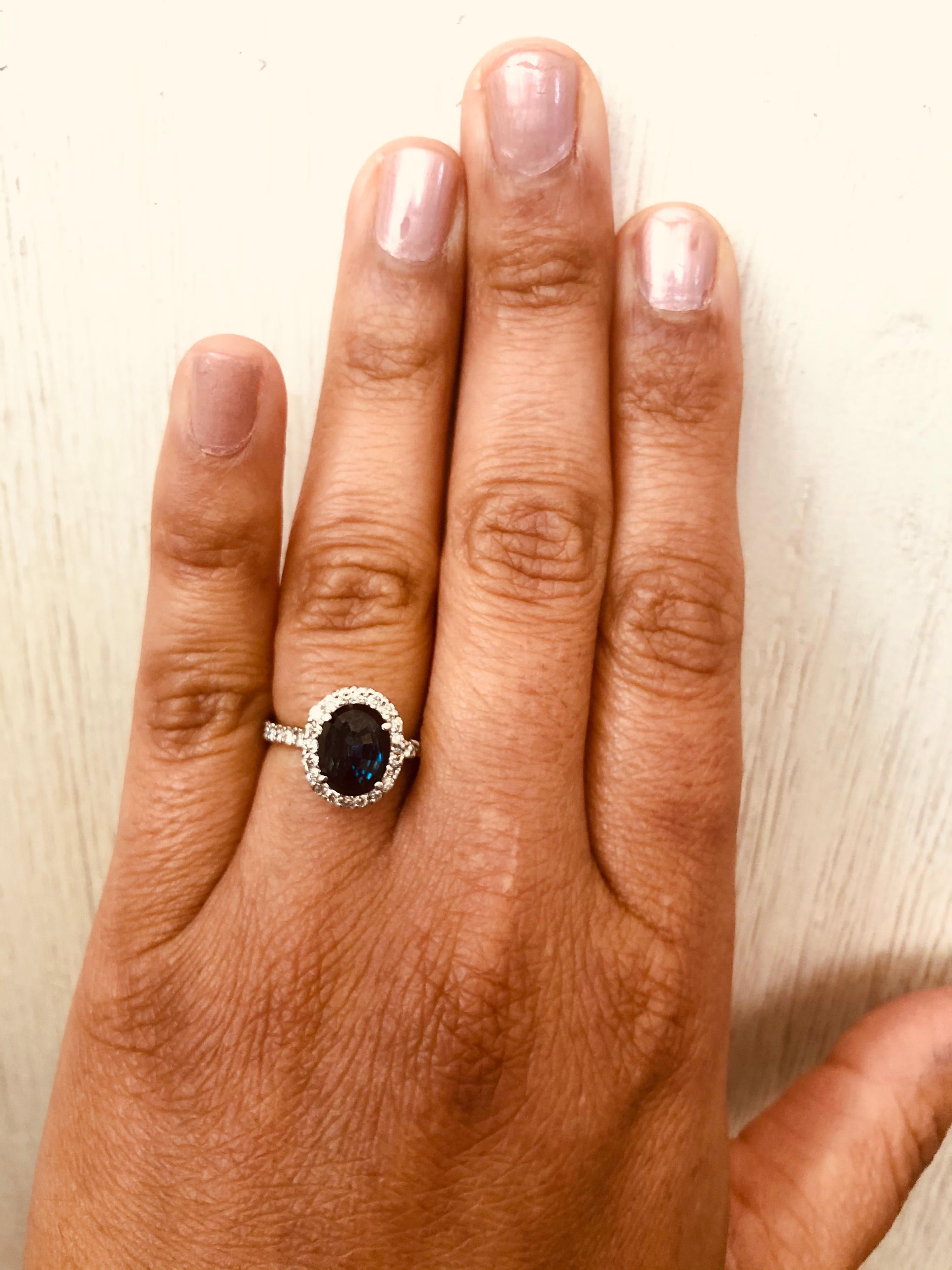 Oval Cut Blue Sapphire Diamond 14 Karat White Gold Ring