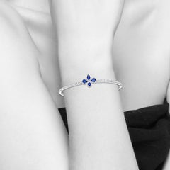 Blue Sapphire Diamond 18 Karat Gold Clover Bangle Bracelet
