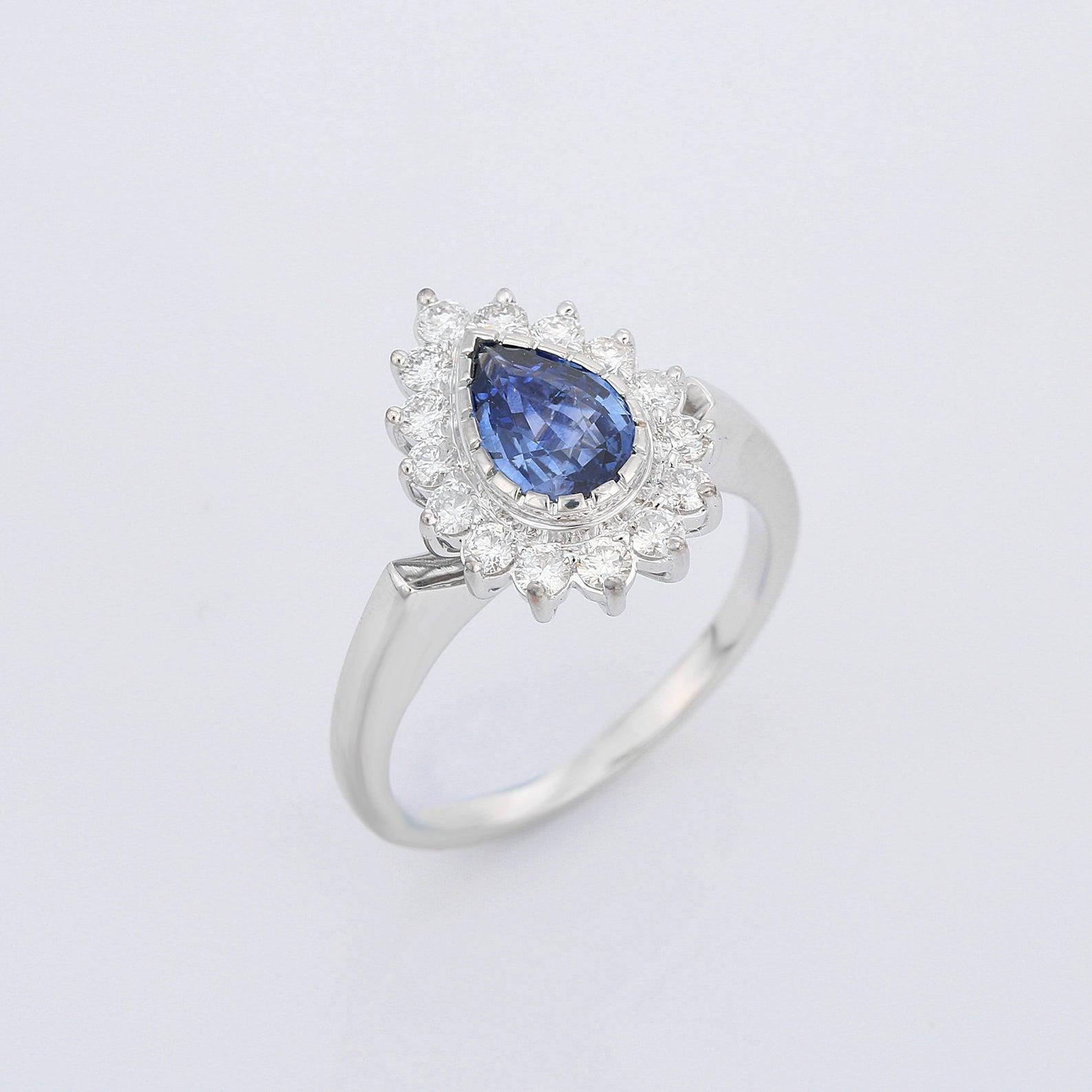 Modern Blue Sapphire Diamond 18 Karat Gold Solitaire Ring For Sale