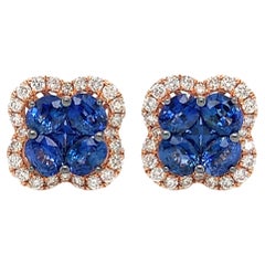 Boucles d'oreilles en or rose 18 carats avec saphir bleu et diamants