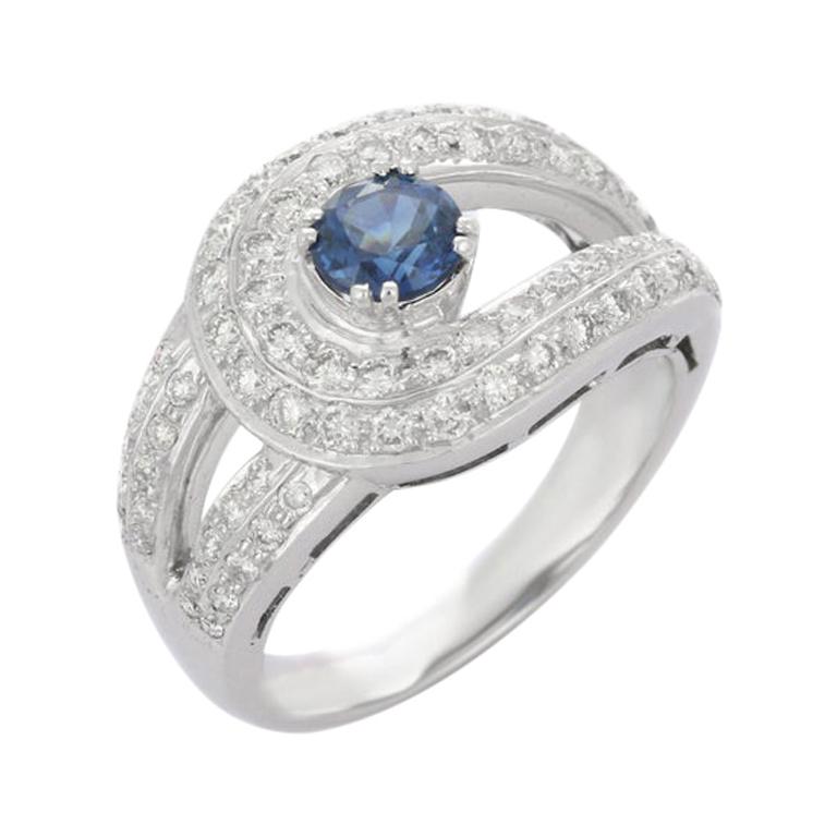 Ring aus 14 Karat Weißgold mit blauem Saphir und Diamant im Angebot