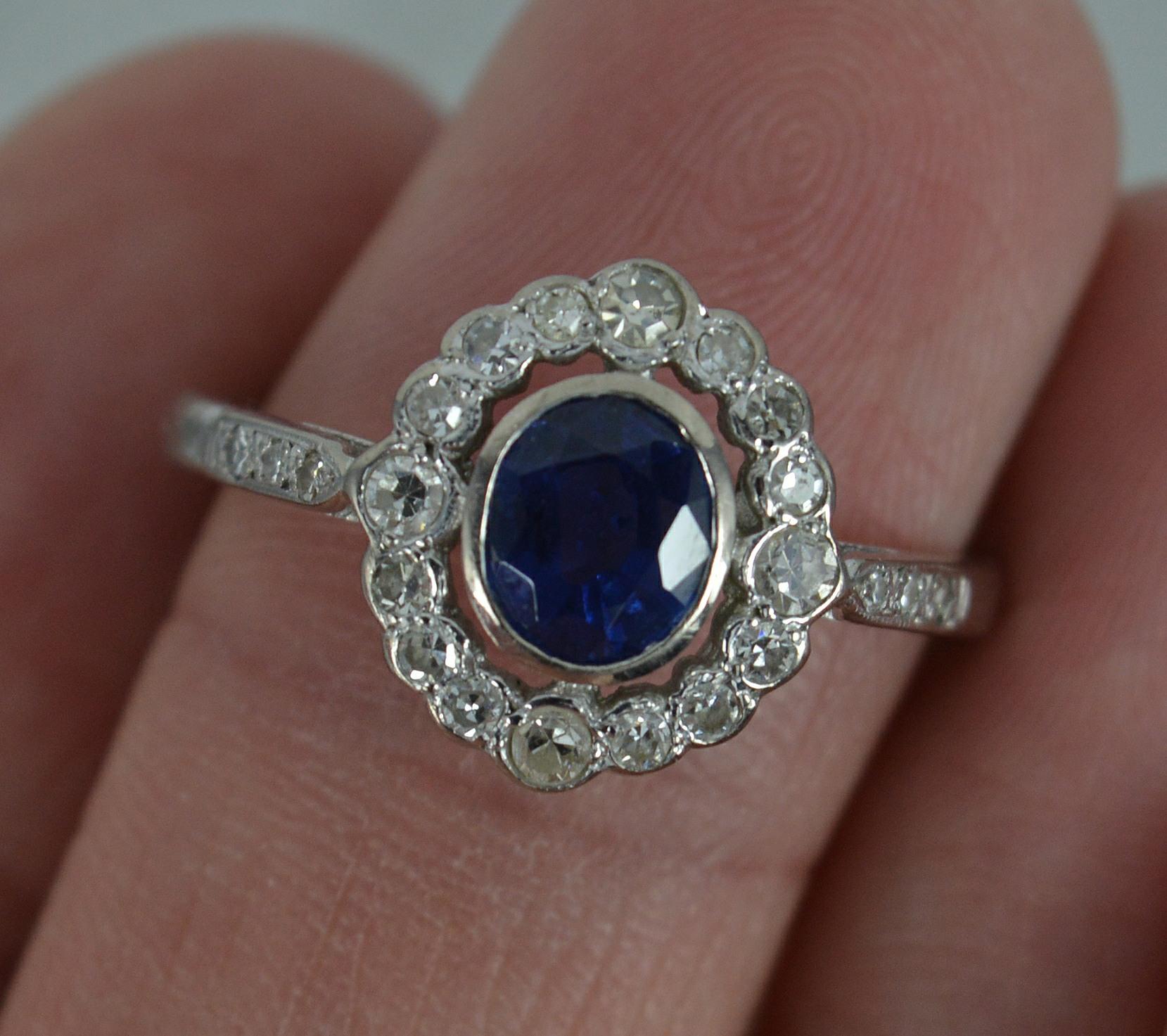 Blue Sapphire and Diamond 18 Carat White Gold Halo Cluster Ring 1