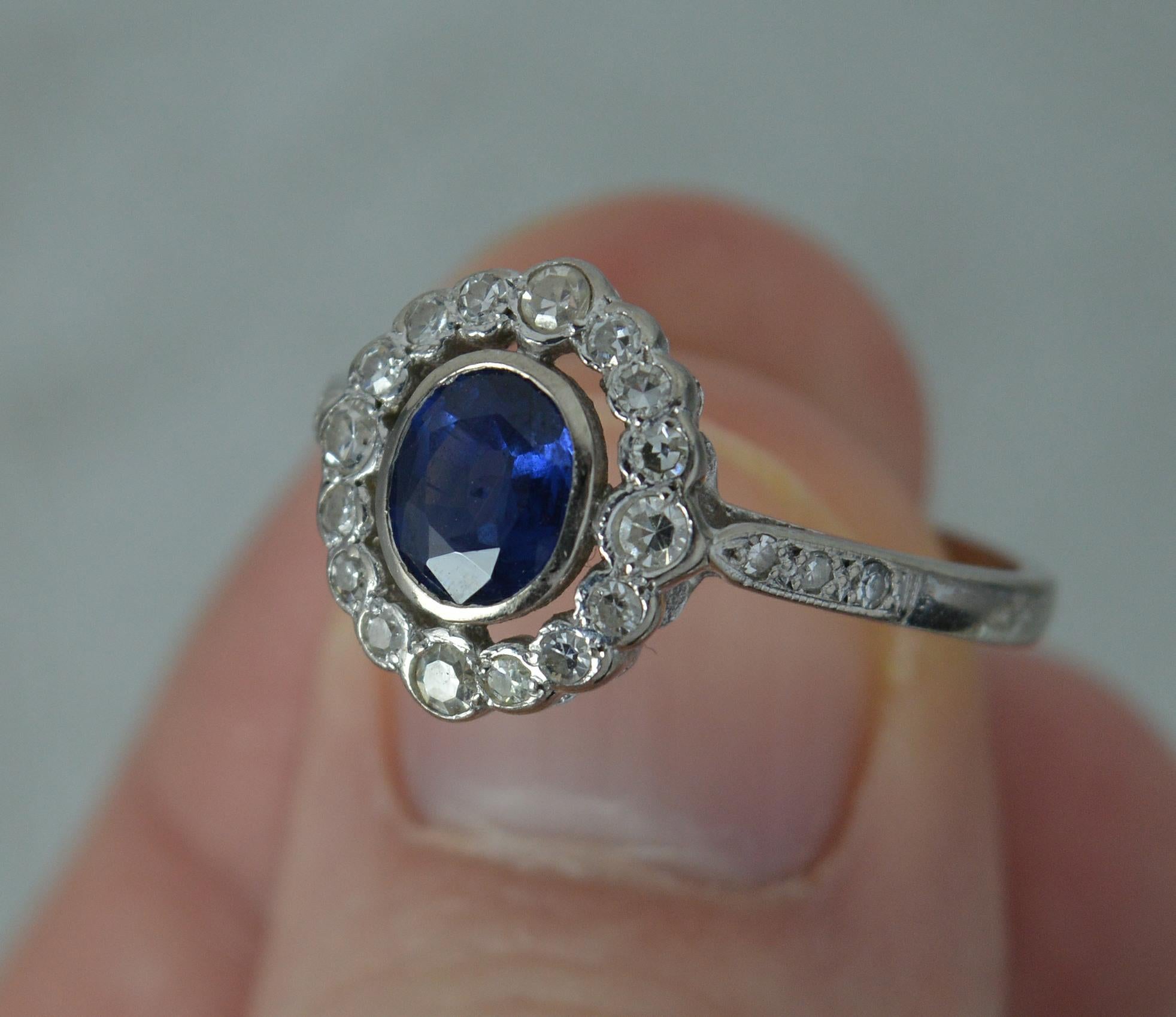 Blue Sapphire and Diamond 18 Carat White Gold Halo Cluster Ring 2