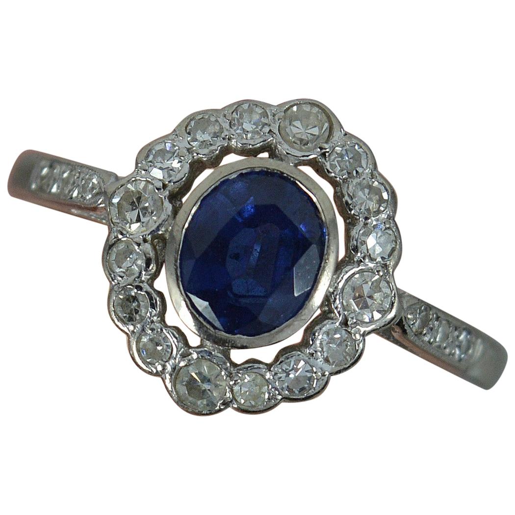 Blue Sapphire and Diamond 18 Carat White Gold Halo Cluster Ring