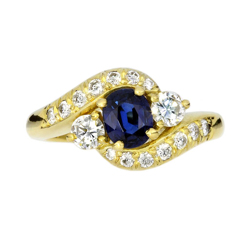 Oval Cut Blue Sapphire & Diamond 18K Bypass Ring For Sale