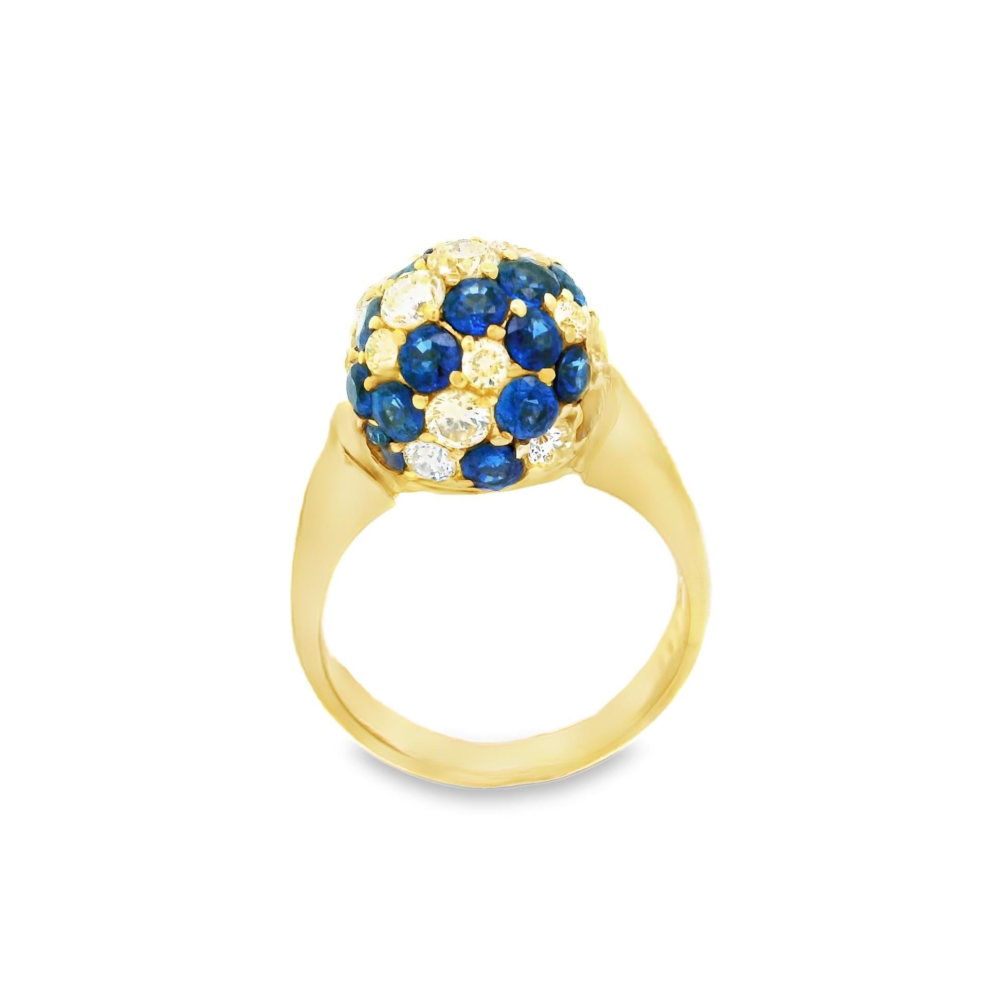 A fun and stylish everyday ring featuring 3.55 carats of bright vivid blue sapphires and 1.60 carats of round brilliant-cut diamonds. They are set in a stylish pattern around a golden sphere. A lovely piece that can be worn casually or dressed up