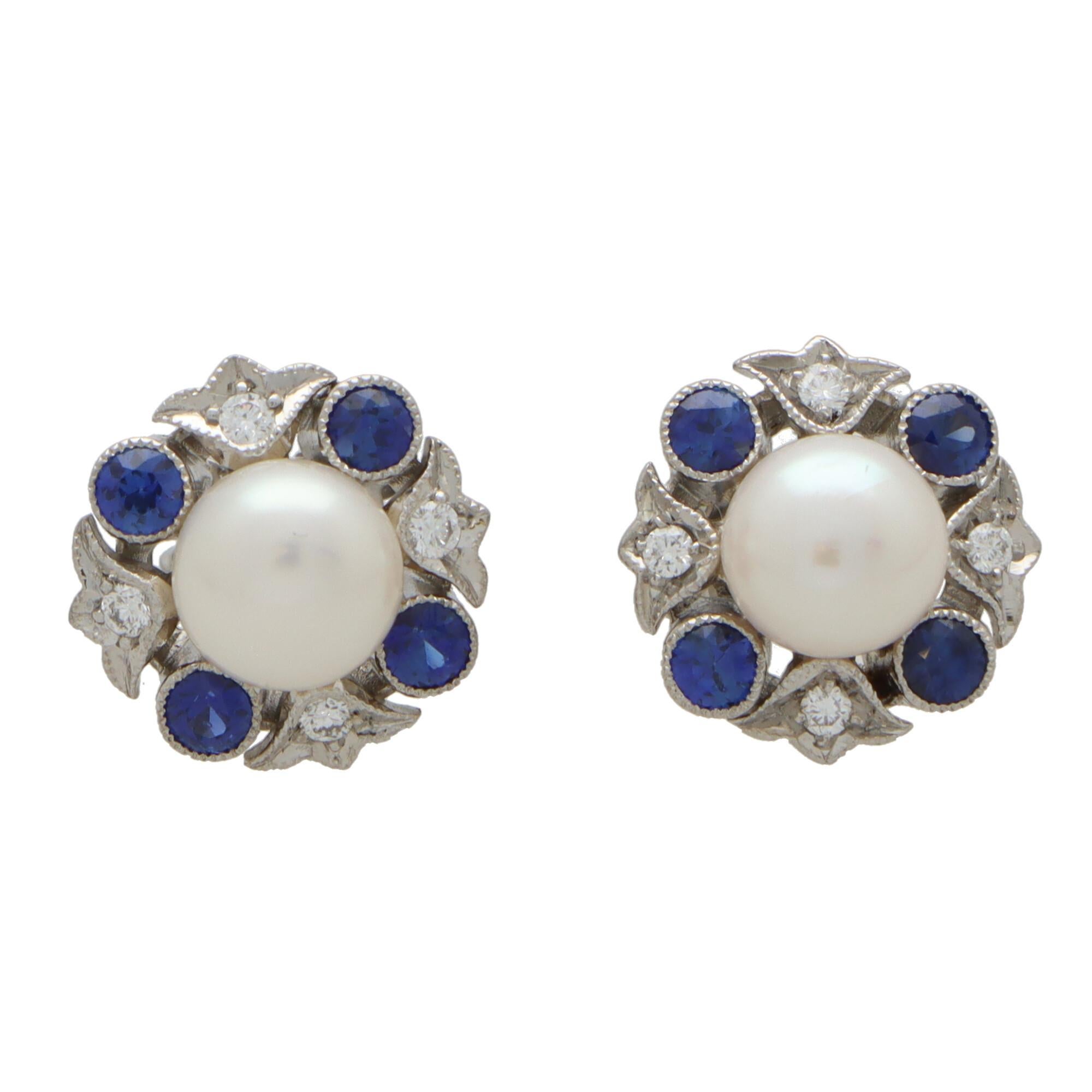 Round Cut Blue Sapphire, Diamond and Pearl Cluster Stud Earrings in 18k White Gold For Sale