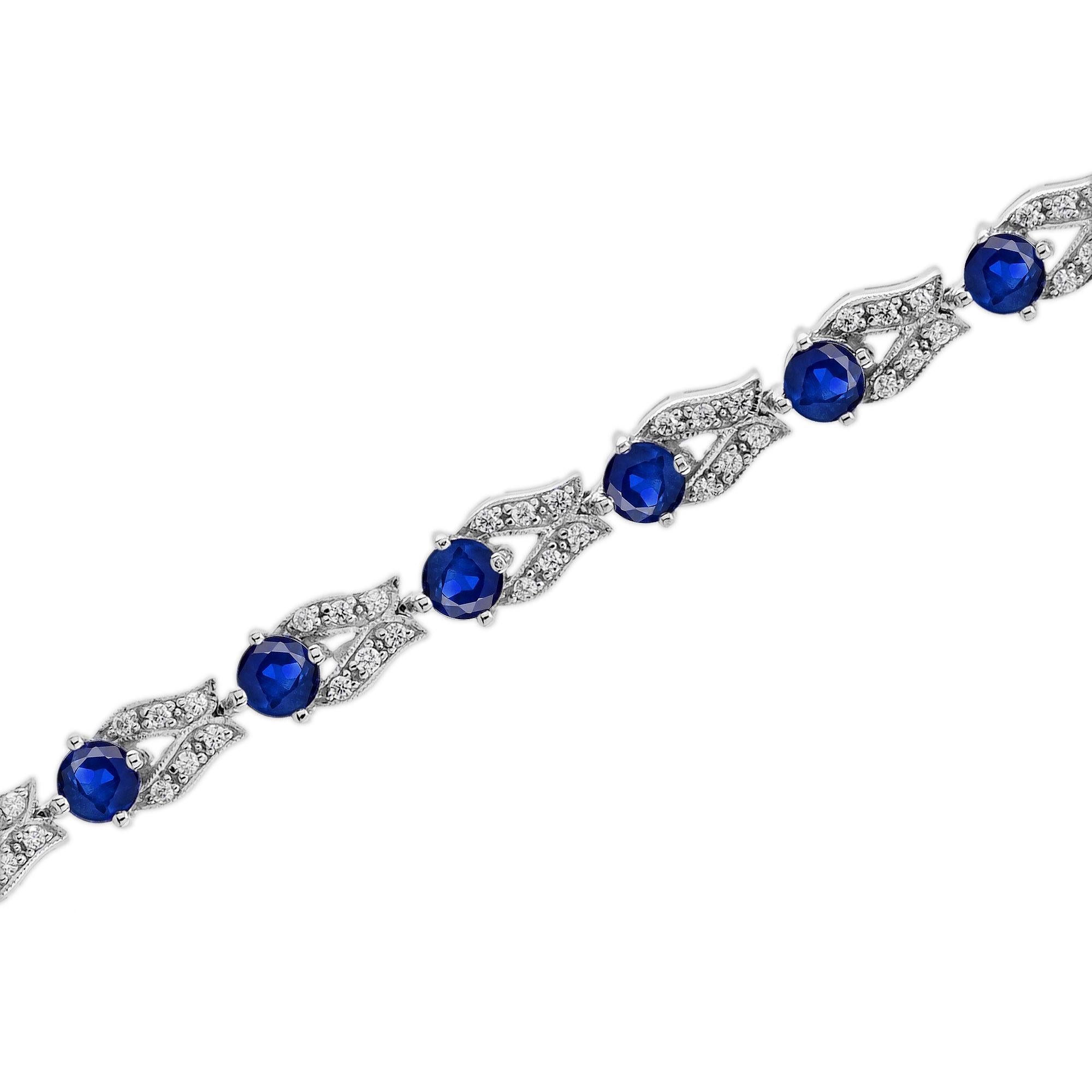 Art déco Bracelet à maillons de style ancien en or blanc 14 carats avec saphir bleu et diamants en vente