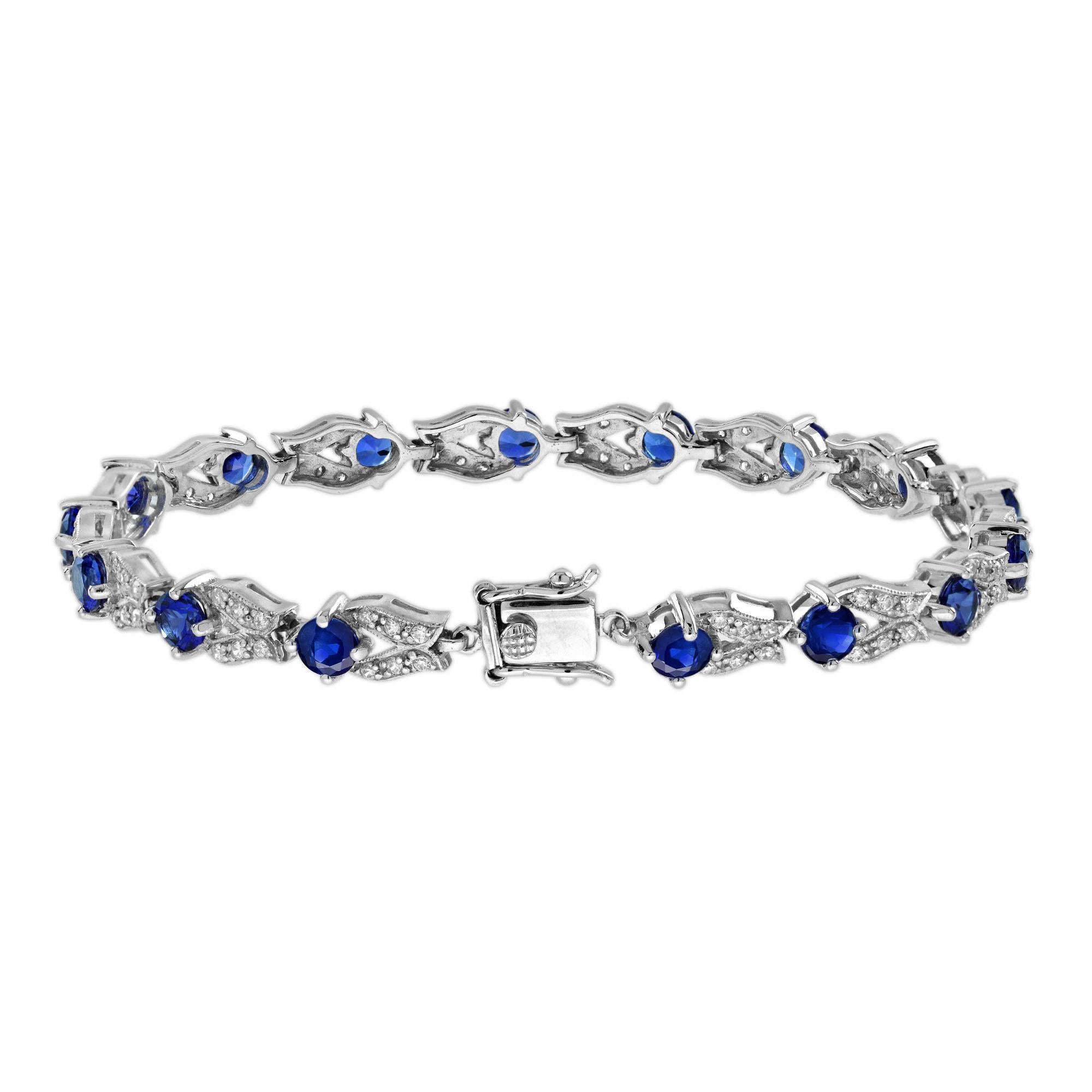 Taille ronde Bracelet à maillons de style ancien en or blanc 14 carats avec saphir bleu et diamants en vente