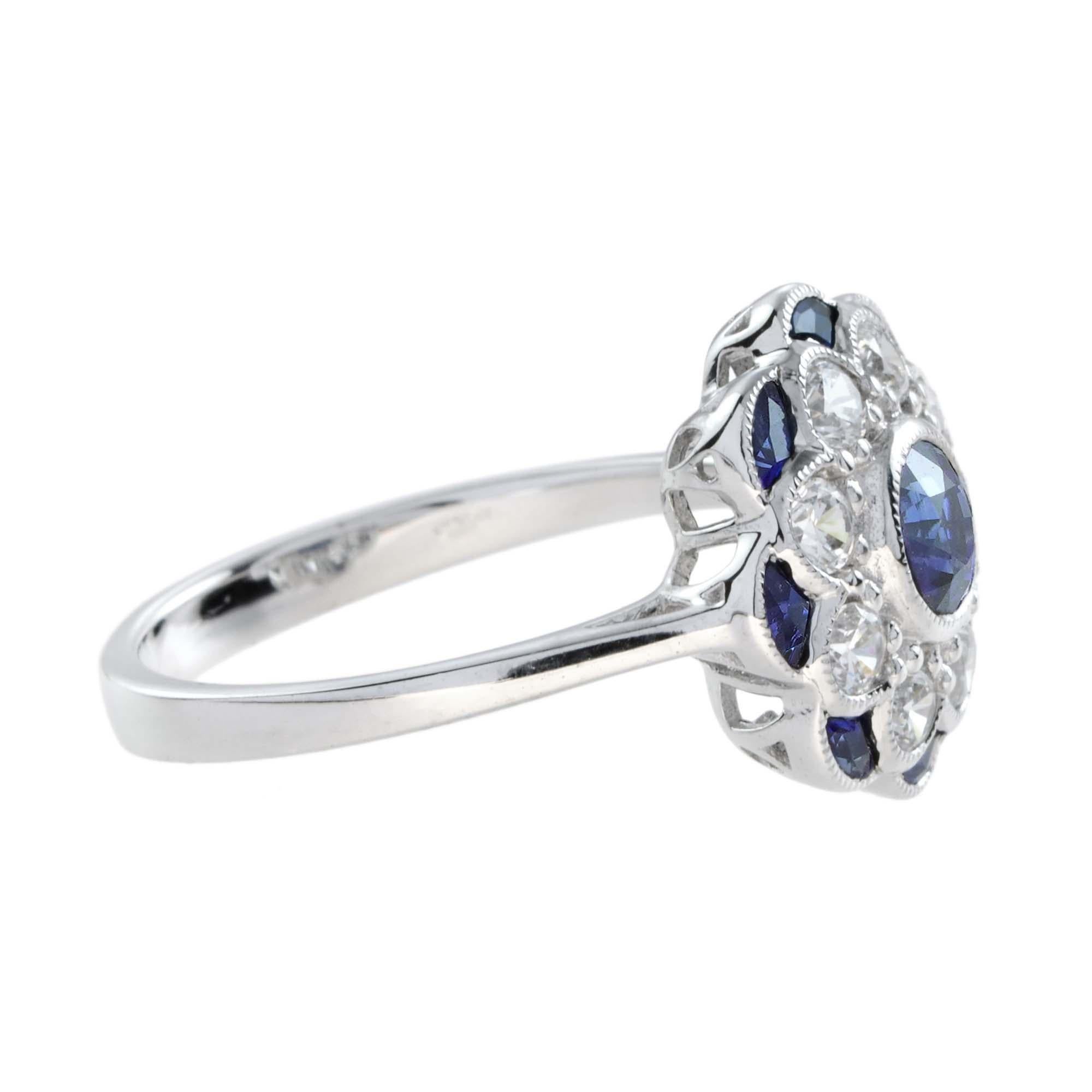 Taglio rotondo Anello di fidanzamento floreale con diamante e zaffiro blu in stile Art Déco in oro bianco 18 carati in vendita