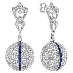 Orecchini pendenti con diamante e zaffiro blu in stile Art Déco in oro bianco 14 carati