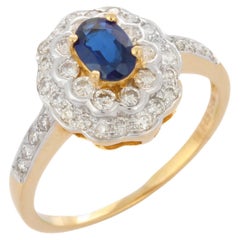 Big Floral Blue Sapphire Cocktail Ring with Inlaid Diamonds in 18K Yellow Gold