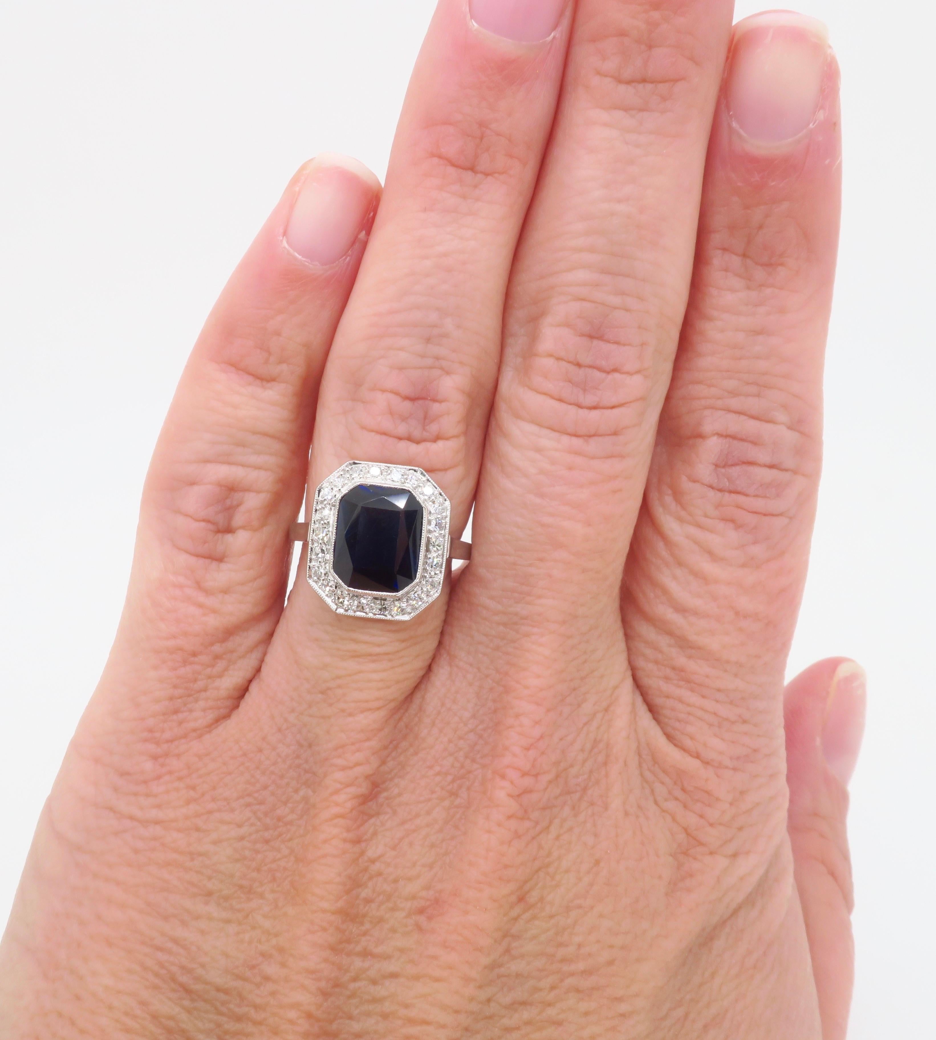 Beautiful Blue Sapphire & Diamond halo ring crafted in Platinum.

Gemstone: Blue Sapphire & Diamond 
Diamond Carat Weight: .22CTW
Diamond Cut: Round Cut Diamonds
Average Diamond Color: F-H 
Average Diamond Clarity: VS
Blue Sapphire Carat Weight: