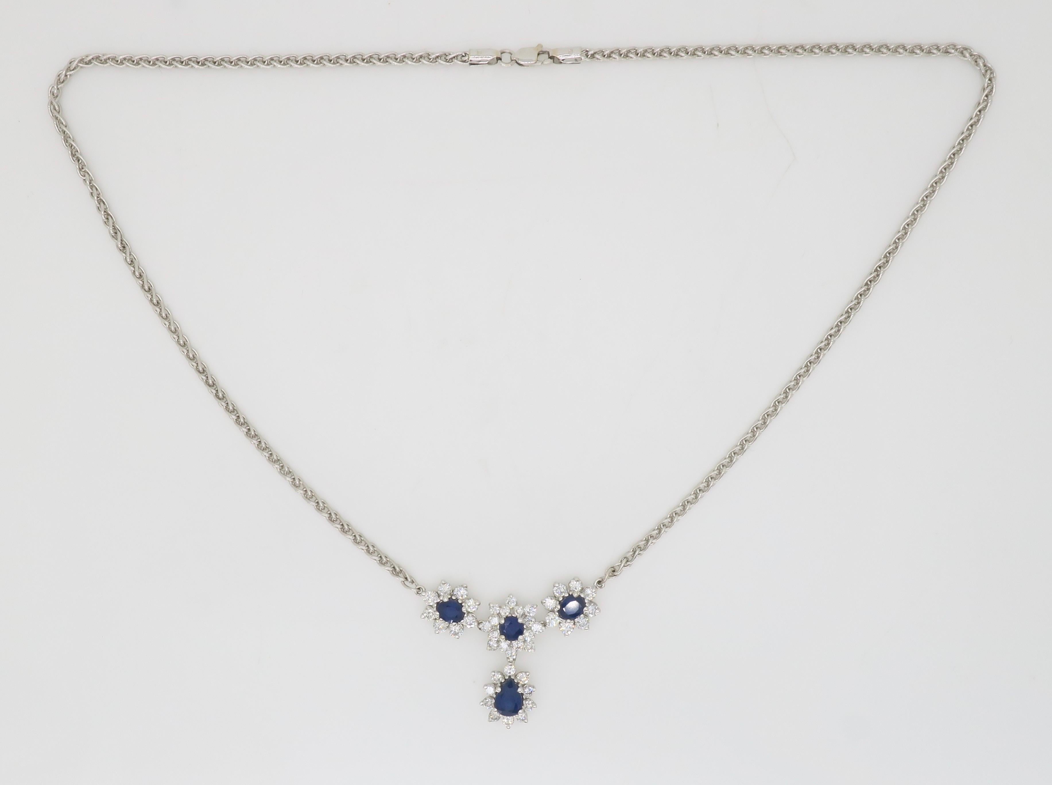 Blue Sapphire & Diamond drop necklace made in 14k white gold. 

Gemstone: Blue Sapphire & Diamond
Diamond Carat Weight: 2.38CTW
Diamond Cut: Round Brilliant Cut Diamonds
Color: Average G-I
Clarity: Average VS-SI
Metal: 14K White Gold 
Length: 18” 