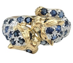 Doppel-Panther-Ring mit blauem Saphir und Diamanten aus zweifarbigem 14-Karat-Gold