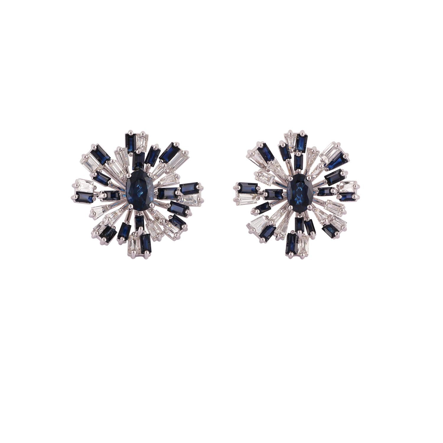 Its an elegant & modern style blue sapphire & diamond earrings studded in 18k white gold features 34 pieces of blue sapphire weight 5.33 carat with 32 pieces of baguette shaped diamonds weight 2.14 carat, this entire earring pair is made of 18k