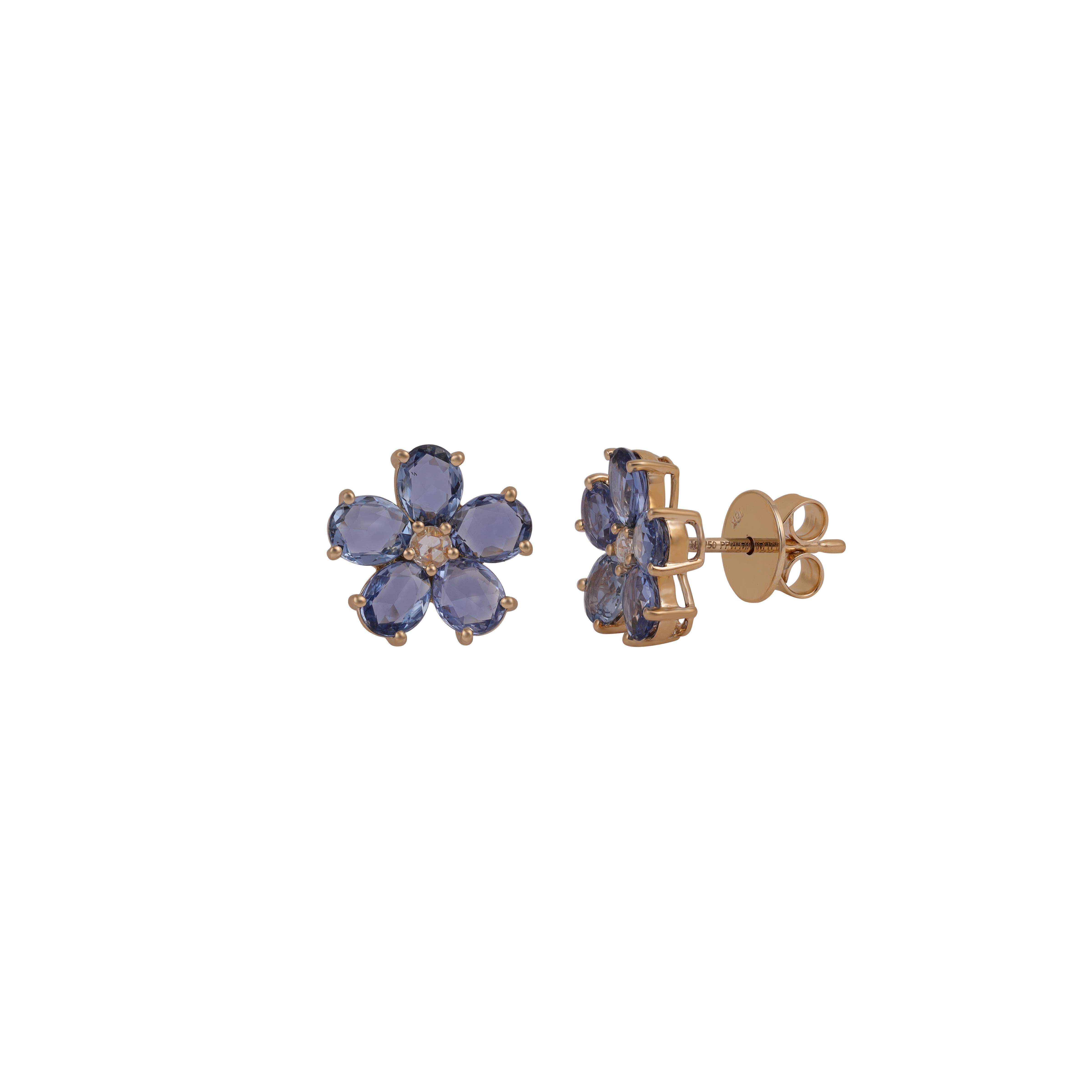 These are an elegant blue sapphire & diamond stud earrings studded in 18k gold features 10 pieces of oval shaped blue sapphires weight 3.74 carats with diamonds weight 0.08 carats, This entire earring pair made of 18k gold, These earrings have a