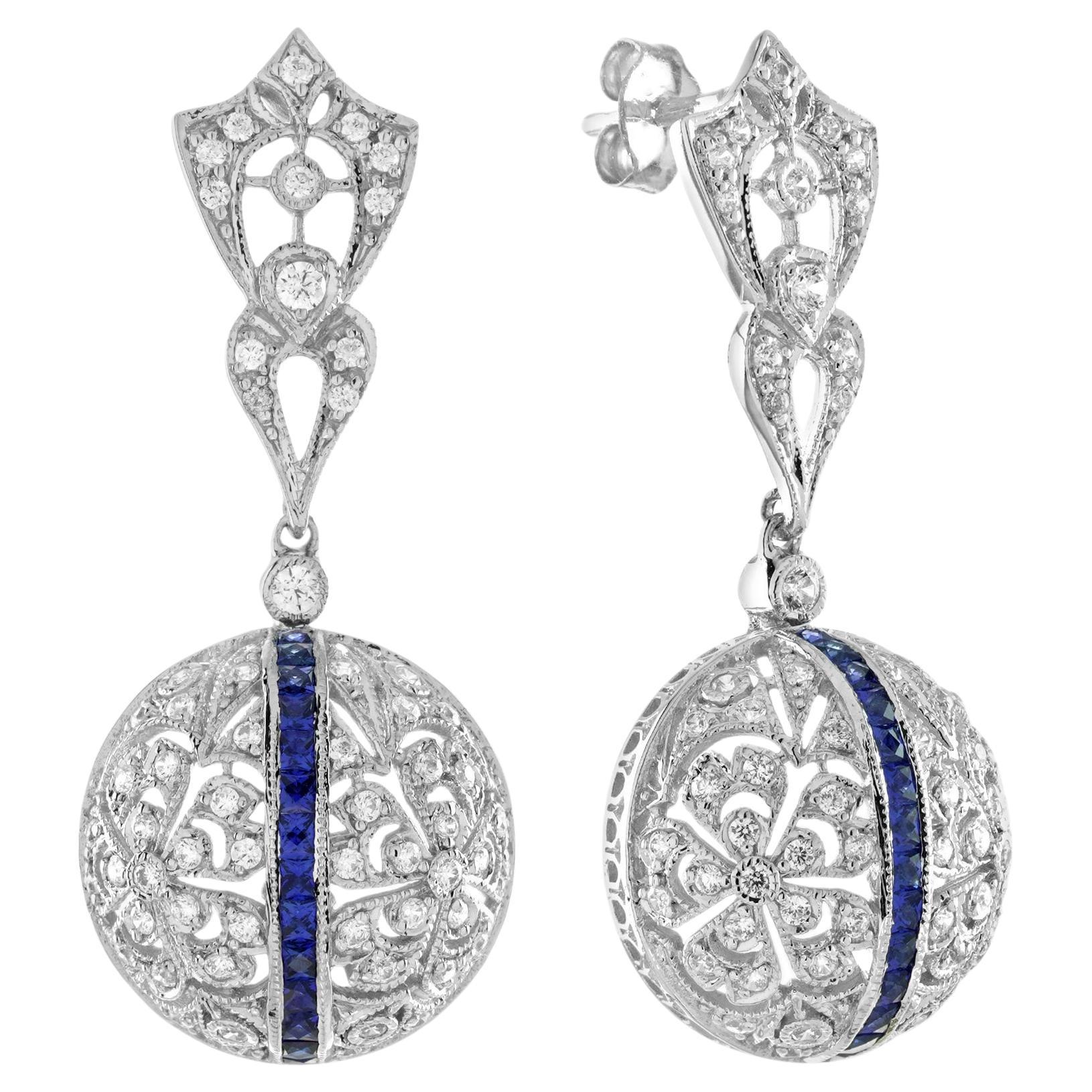 Orecchini a goccia in oro bianco con zaffiro blu e diamanti in stile edoardiano, traforati e penzolanti in vendita