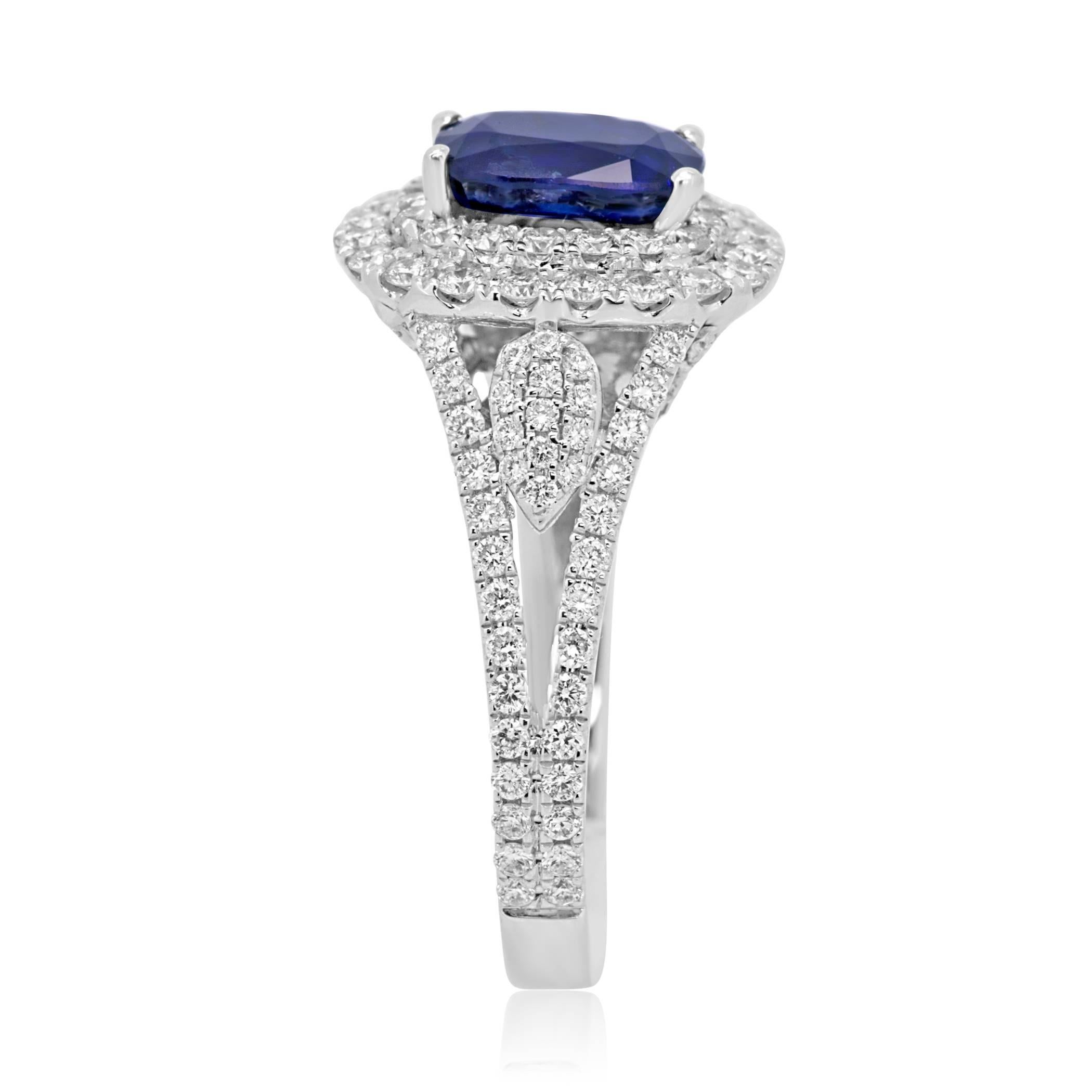 Gorgeous Blue Sapphire Cushion 1.53 Carat encircled in a double Halo of White Diamond 1.05 Carat in Stunning 14K White Gold Bridal Fashion Split Shank Ring.

Style available in different price ranges. Prices are based on your selection of 4C's Cut,