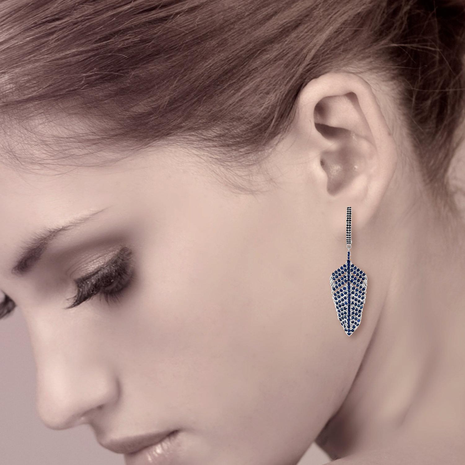 These earrings are handmade in 14-karat gold and sterling silver.  
It is set with 5.03 carats blue sapphire and .32 carats of diamonds.

FOLLOW  MEGHNA JEWELS storefront to view the latest collection & exclusive pieces.  Meghna Jewels is proudly