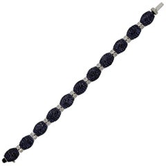 Bracciale in oro con diamanti e zaffiri blu
