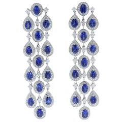 Boucles d'oreilles pendantes chandelier en or avec saphir bleu et diamant