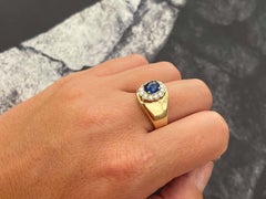 Anello a fascia con zaffiro blu e diamante in oro giallo 14 carati