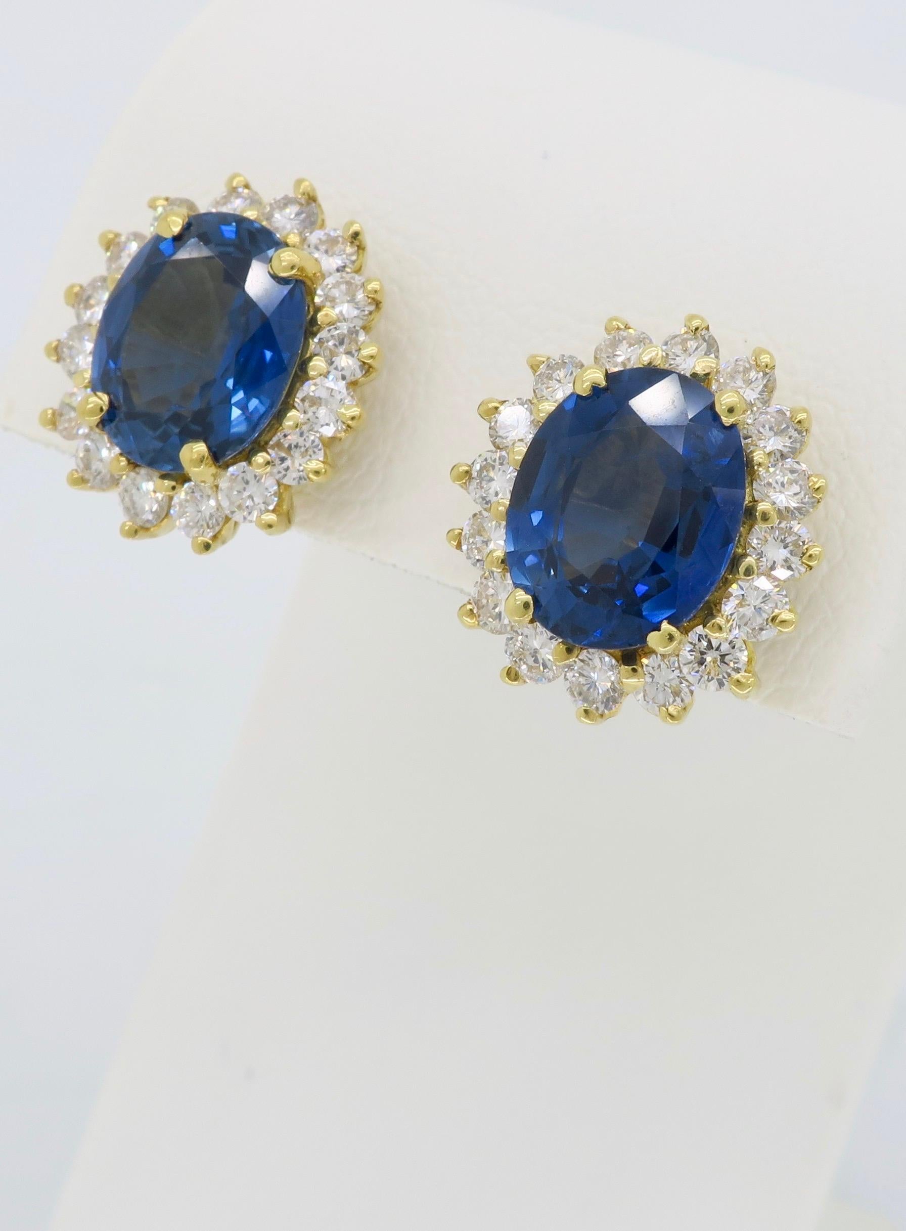 Oval Cut Blue Sapphire and Diamond Halo Earrings For Sale