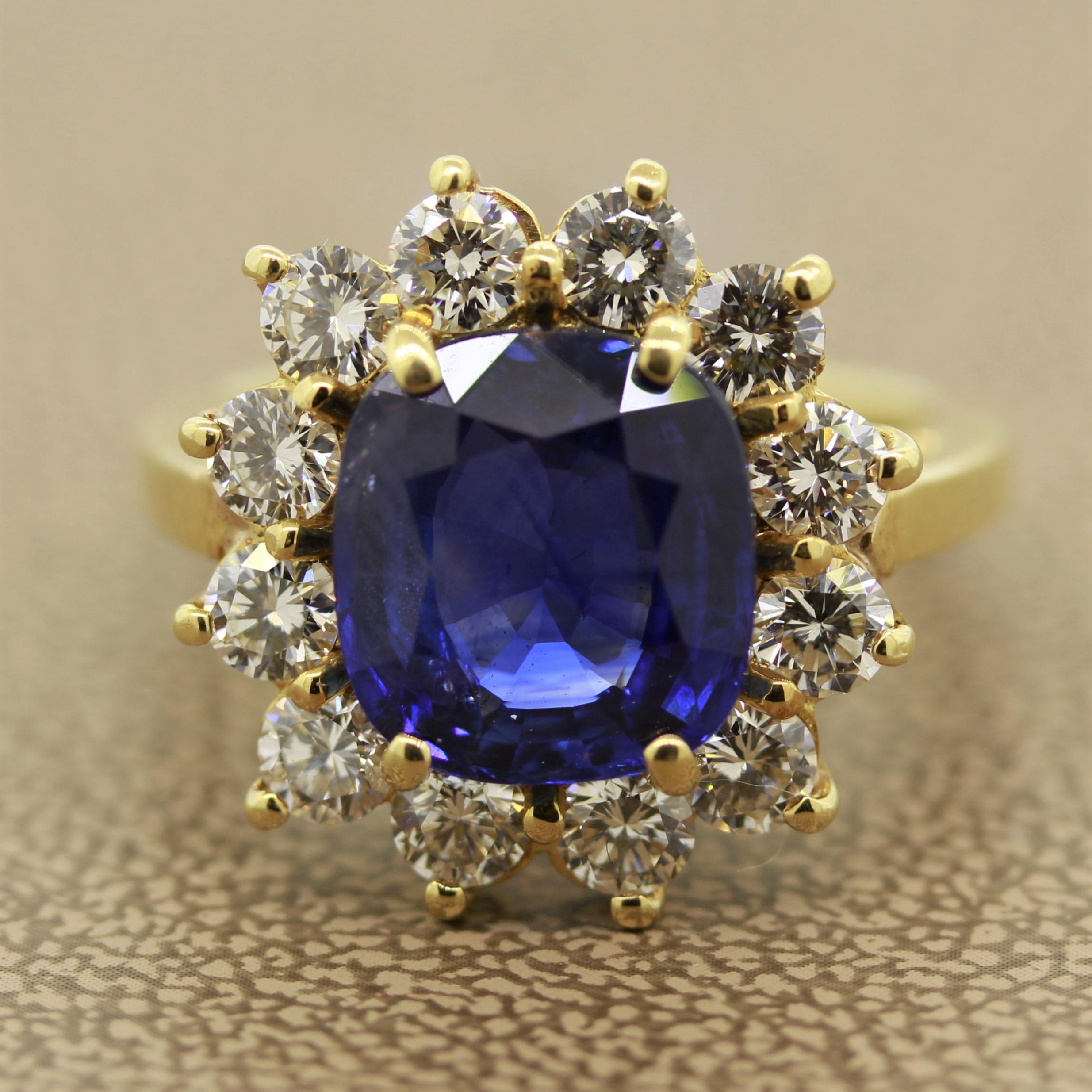 A classic haloed sapphire ring featuring a 4.96 carat blue sapphire certified by the GIA. The sapphire has a pleasing blue color typical from Ceylon, Sri Lanka, which has been a classic source of fine sapphires for hundreds of years. It is haloed by