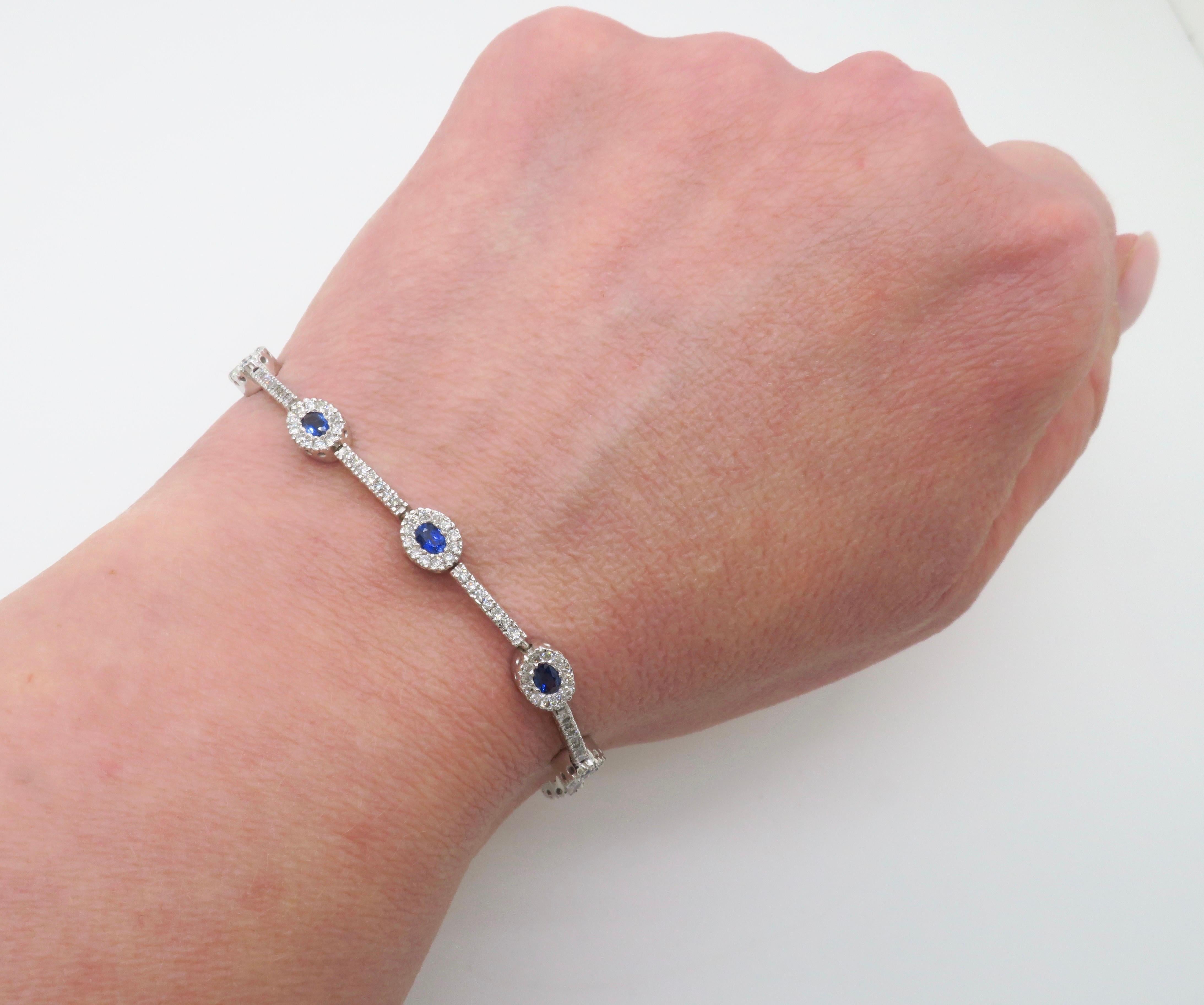 Blue Sapphire and Diamond Halo bracelet made in 14k white gold. 

Diamond Carat Weight: 2.04CTW
Diamond Cut: Round Brilliant Cut 
Color: F-H
Clarity: VS-SI
Blue Sapphire Carat Weight: 2.50CTW 
Metal: 14K White Gold
Marked/Tested: Stamped 