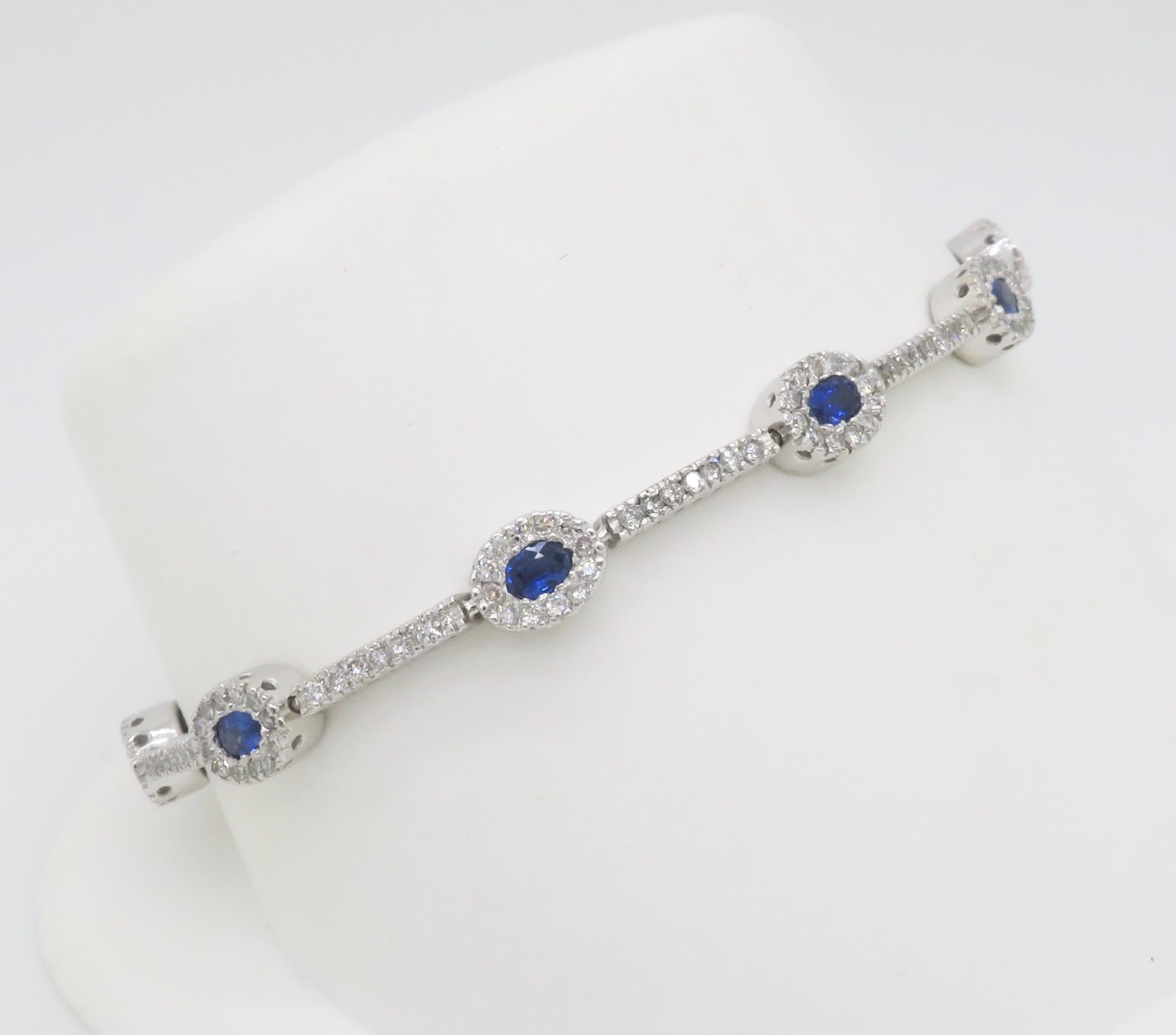 Blue Sapphire & Diamond Halo Line Bracelet in White Gold For Sale 1