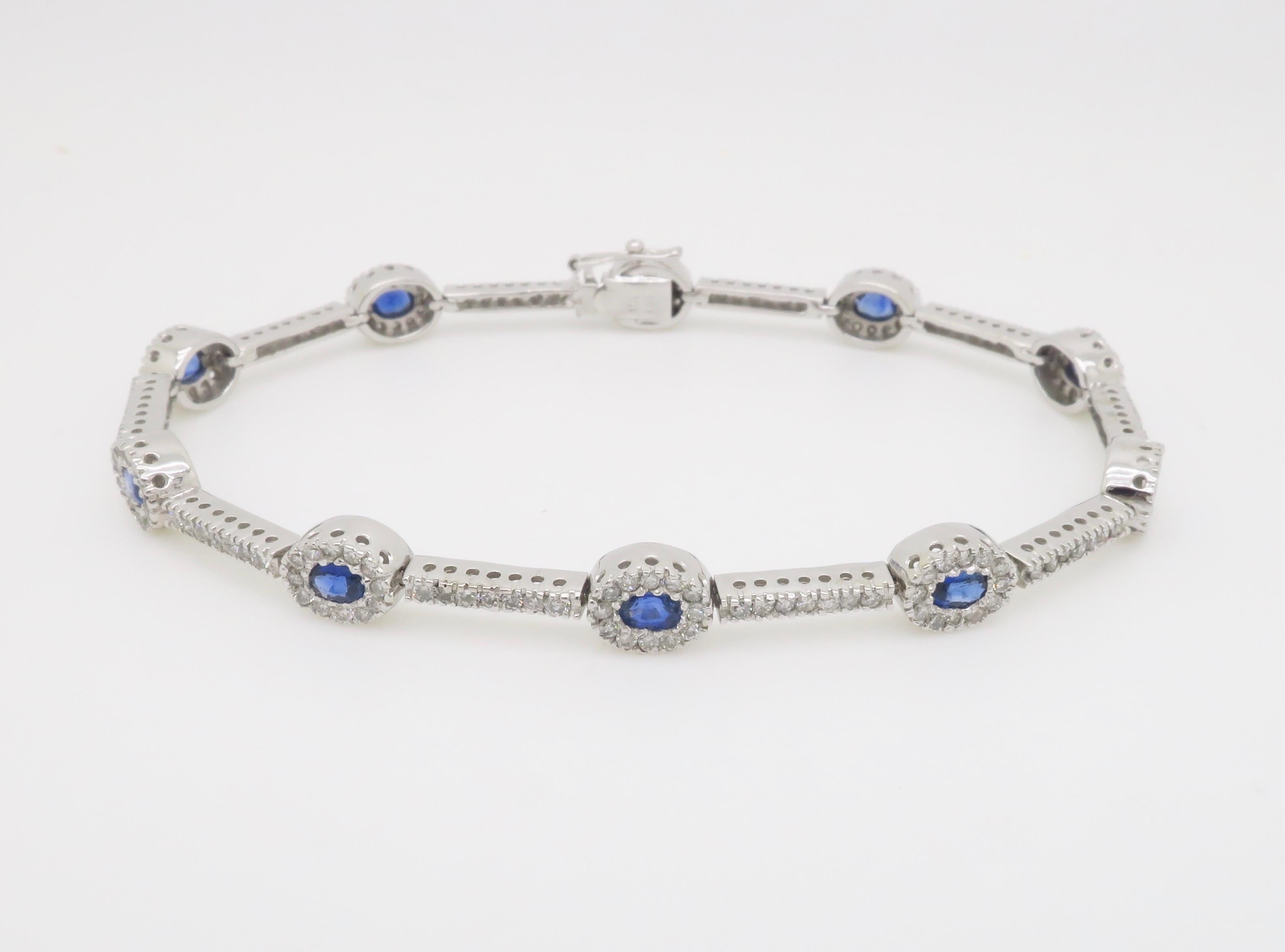 Blue Sapphire & Diamond Halo Line Bracelet in White Gold For Sale 2