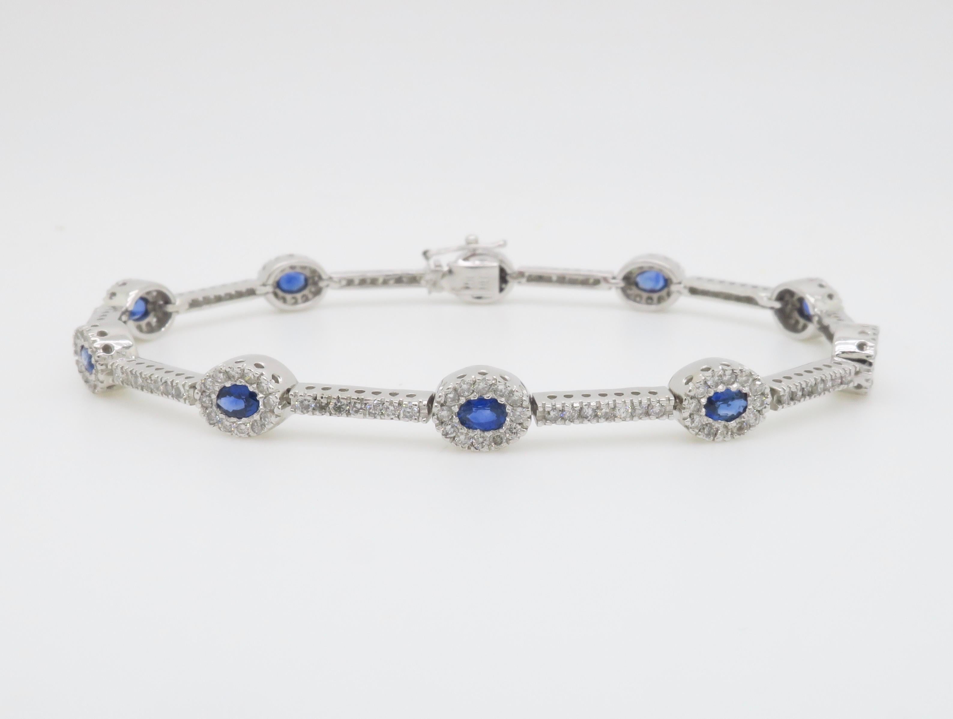 Blue Sapphire & Diamond Halo Line Bracelet in White Gold For Sale 3
