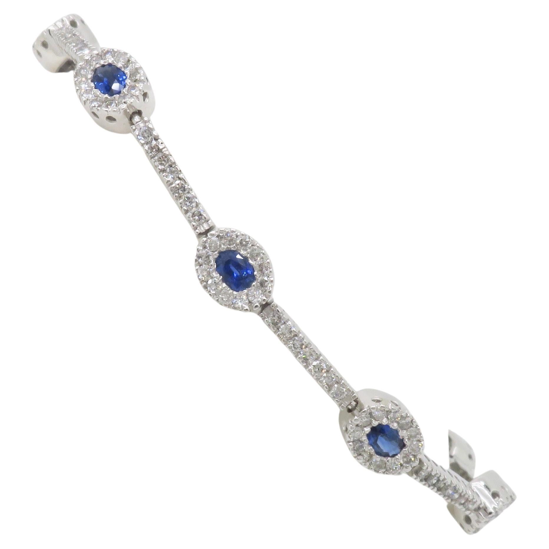 Blue Sapphire & Diamond Halo Line Bracelet in White Gold  For Sale