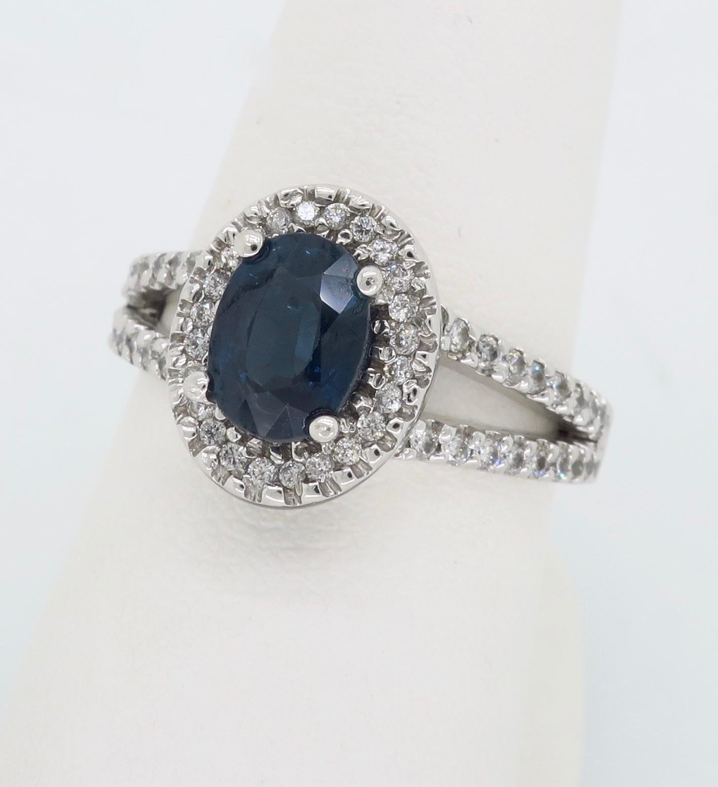 Oval Cut Blue Sapphire and Diamond Halo Ring